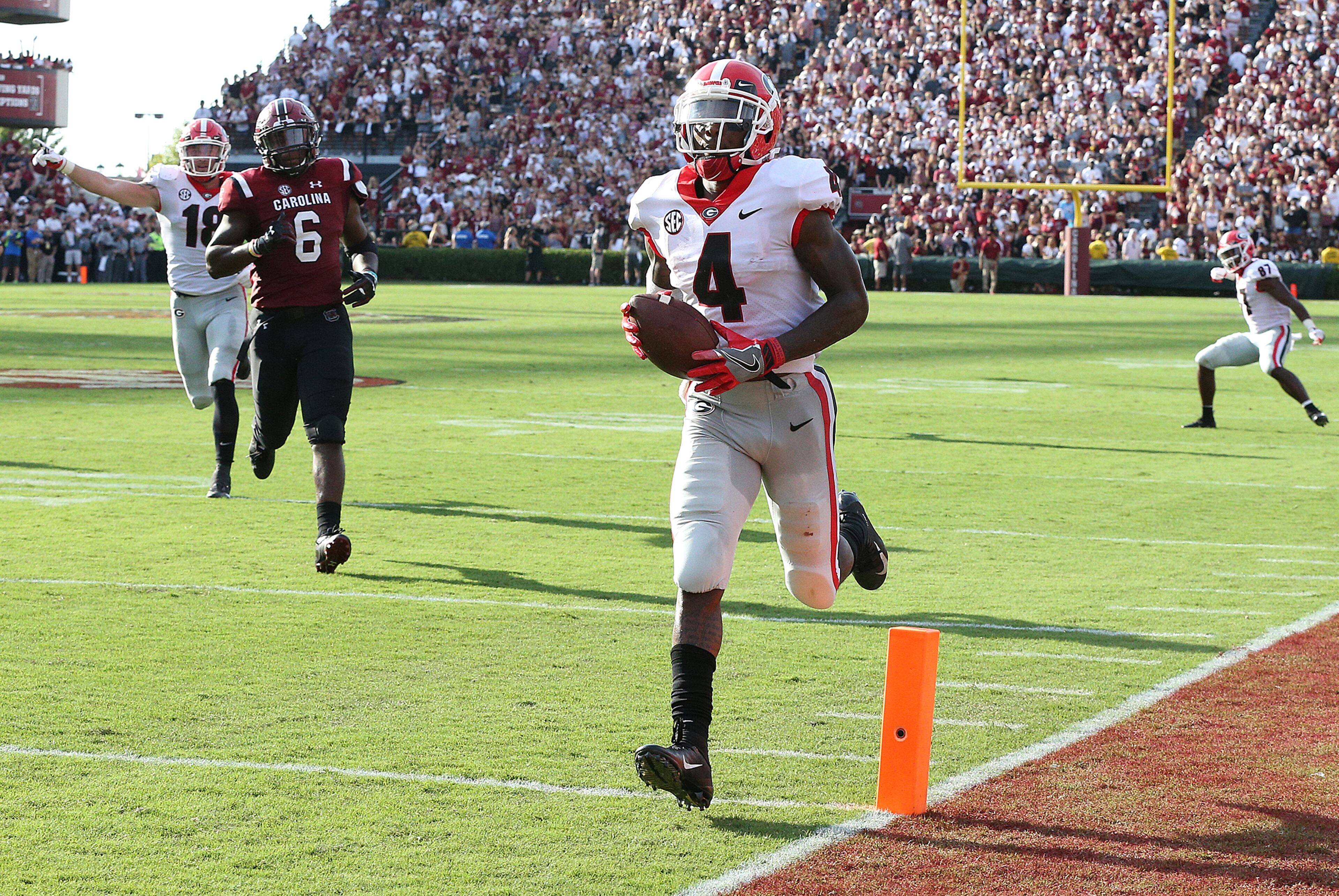 Georgia wide receiver Mecole Hardman jogs into the endzone for a touchdown and a 27-10 lead over South Carolina during third quarter in a NCAA college football game on Saturday, Sept 8, 2018, in Columbia. Curtis Compton/ccompton@ajc.com