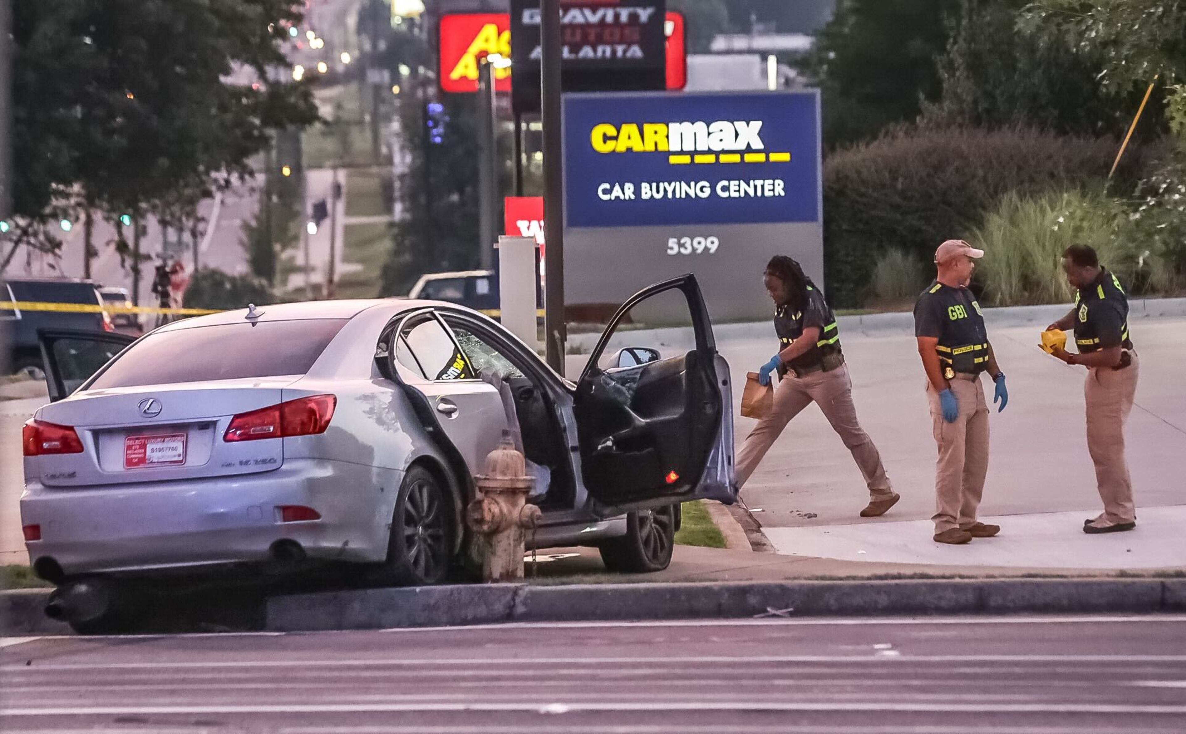 GBI agents are investigating Friday morning after a burglary call led to a pursuit, crash and subsequent shootout with Brookhaven police the night before, officials said.