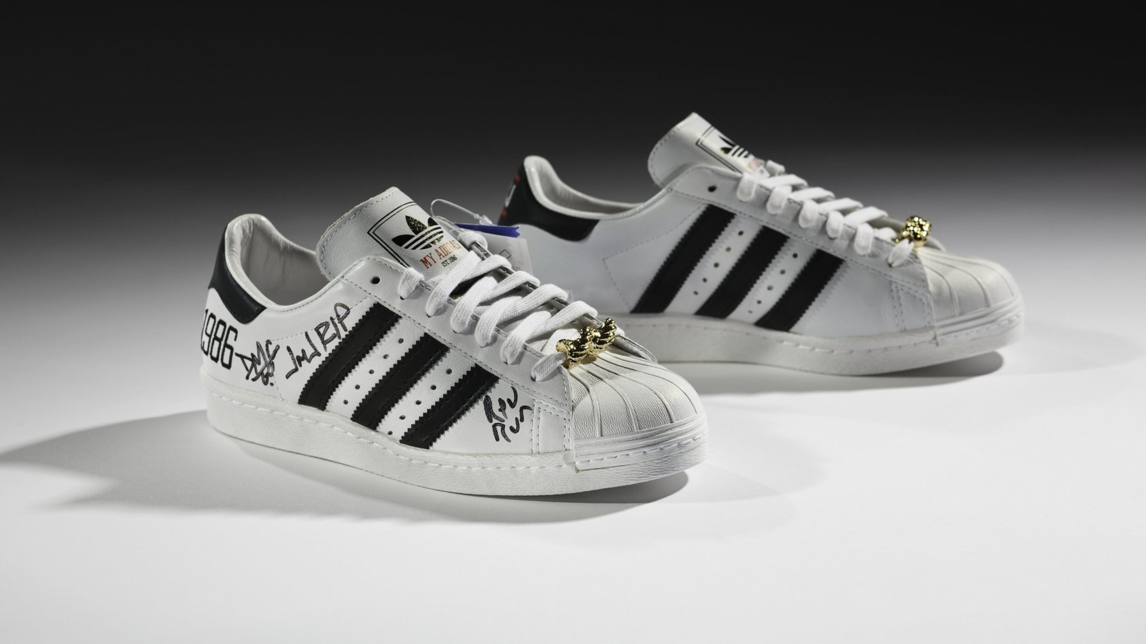 These Adidas sneakers were autographed by the members of rap group Run DMC, who added a tribute to their late turntablist, Jam Master Jay. CONTRIBUTED BY RON WOOD