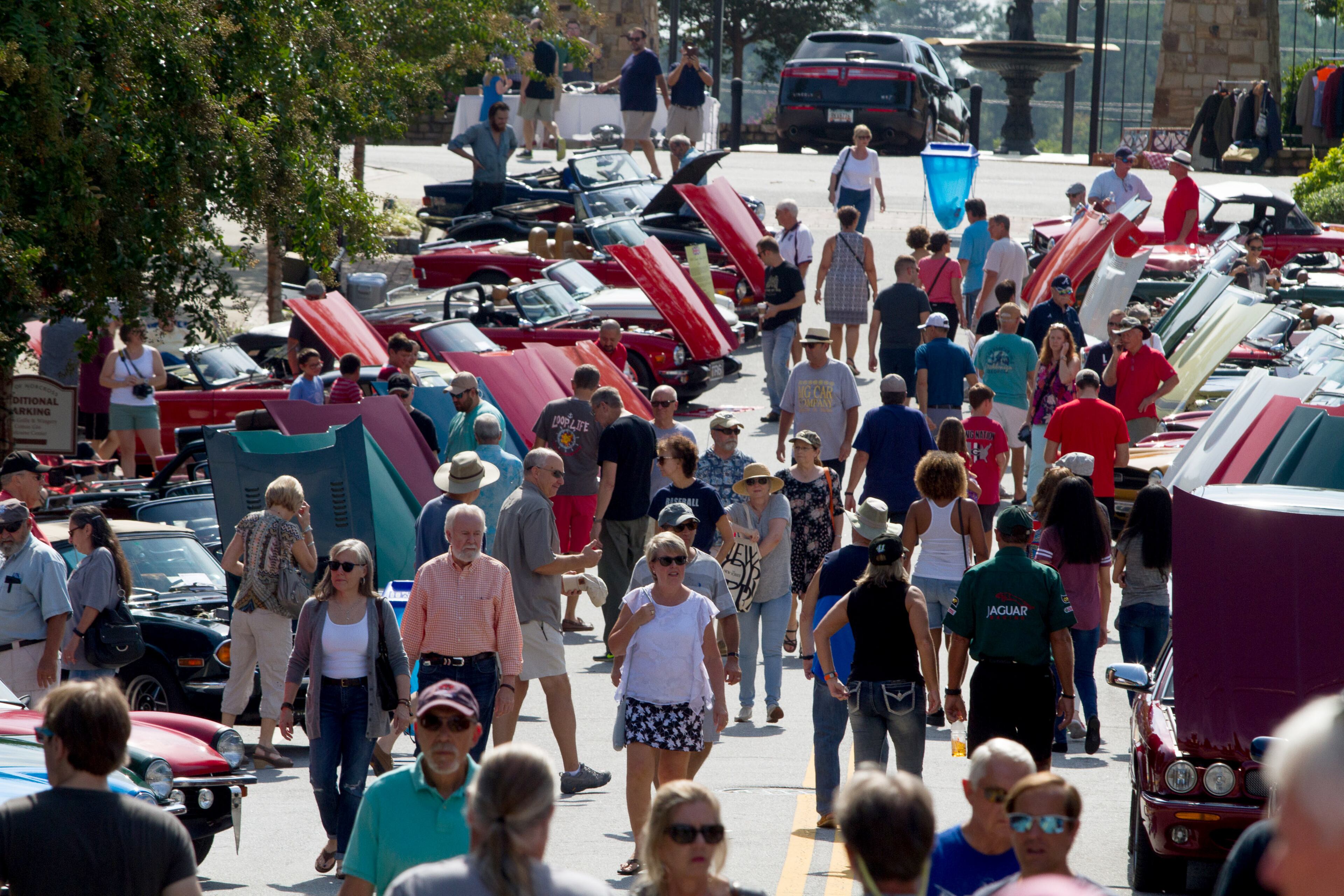 A large crowd looks over some of the more than 400 cars and motorcycles during the 8th annual Atlanta British Car Fayre in downtown Norcross on Saturday, Sept. 8, 2018. (Photo: STEVE SCHAEFER / SPECIAL TO THE AJC)
