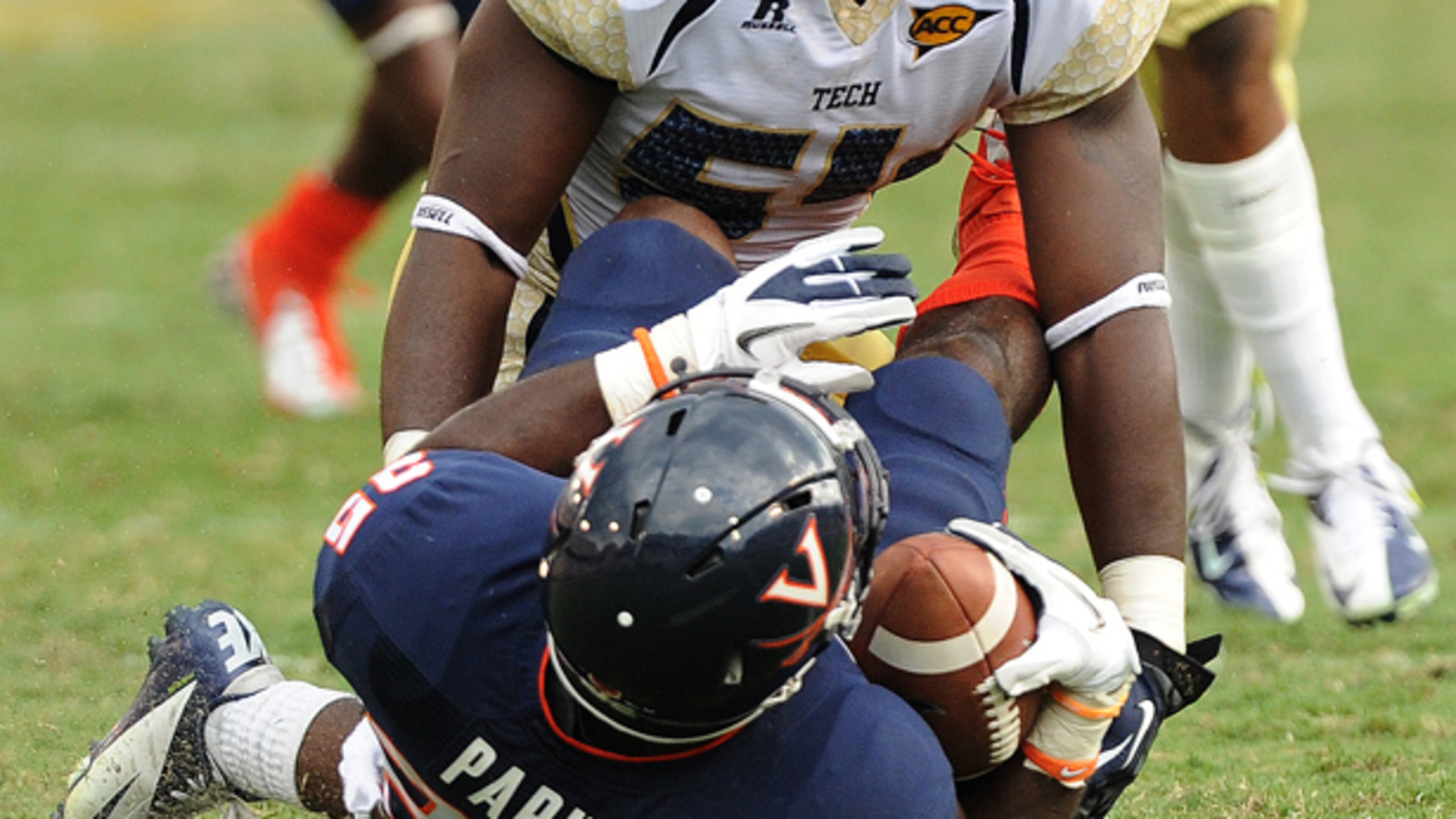 September 15, 2012 -Atlanta: Georgia Tech's Quayshawn Nealy (54) stands over Virginia's Kevin Parks (25) after delivering a hard hit during their game at Bobby Dodd Stadium on Saturday, September 15, 2012. Georgia Tech won the game 56 to 20. JOHNNY CRAWFORD /JCRAWFORD@AJC.COM Georgia Tech linebacker Quayshawn Nealy sounded a positive note Sunday at the ACC Kickoff in Greensboro, N.C.