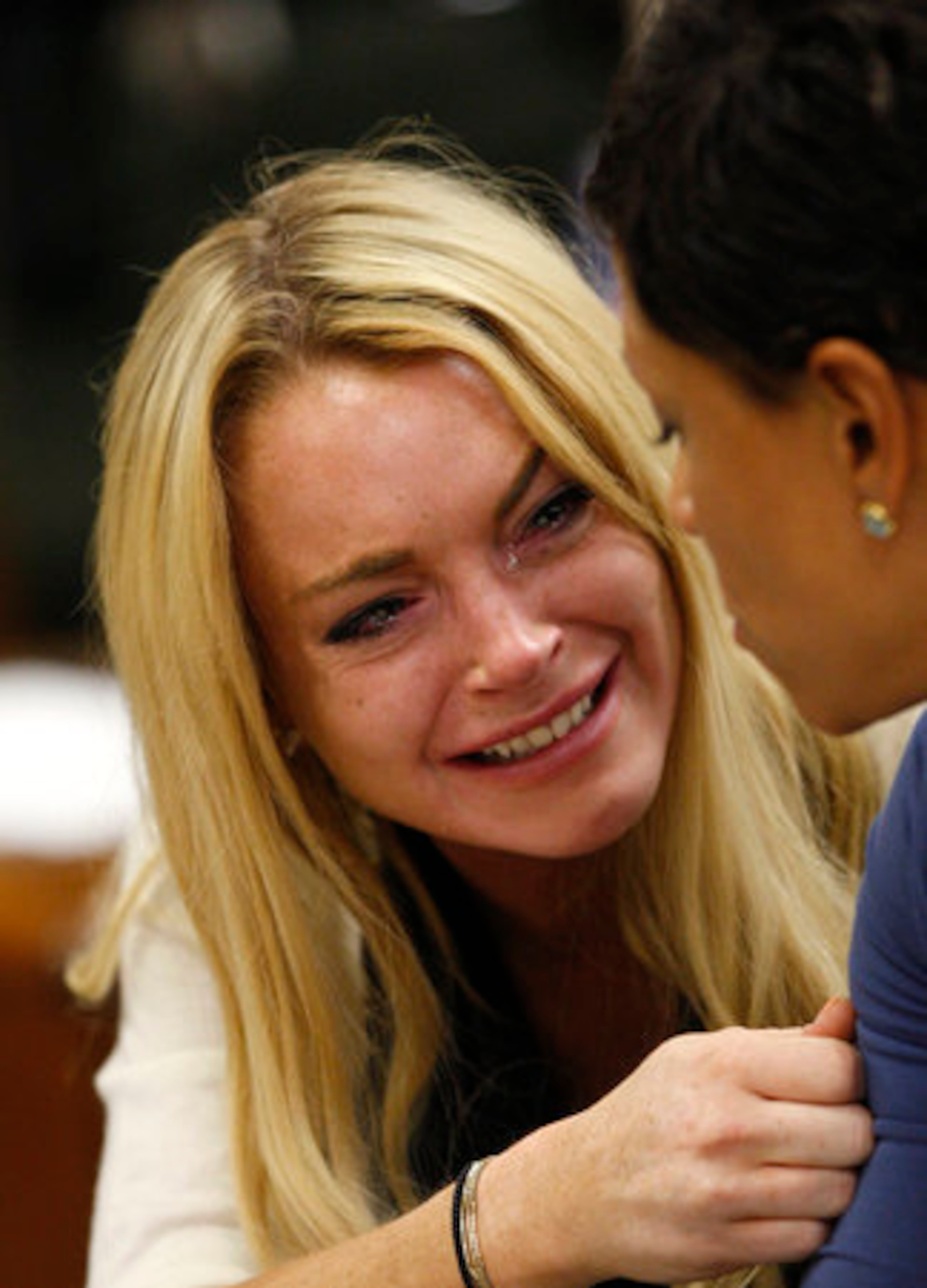 Lindsay Lohan reacts after the sentencing.