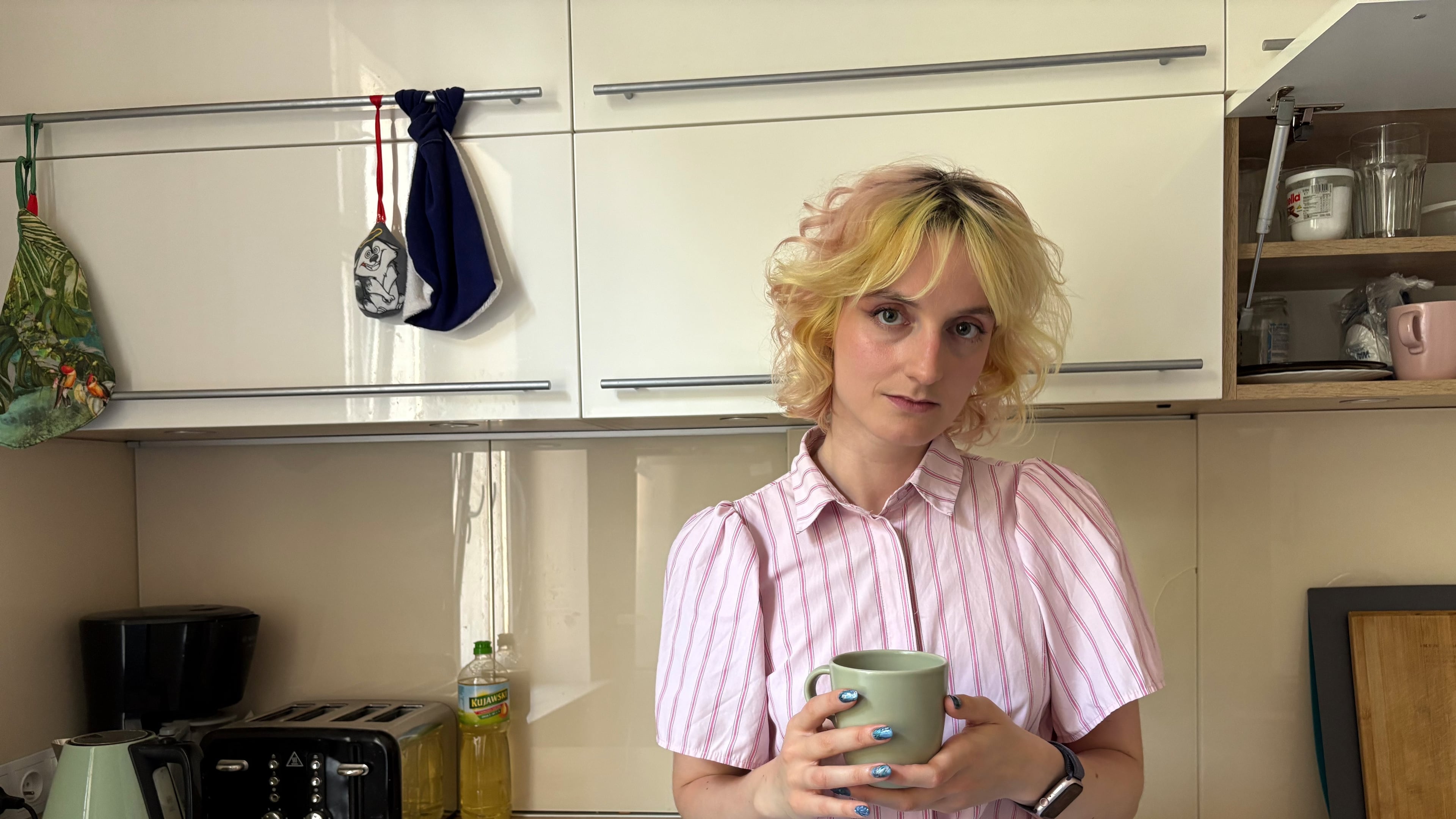 Nastya Podorozhnya stands in the kitchen of the shelter which the Martynka non-profit is running in Krakow, Poland, Thursday, July 2, 2026. (AP Photo/Claudia Ciobanu)