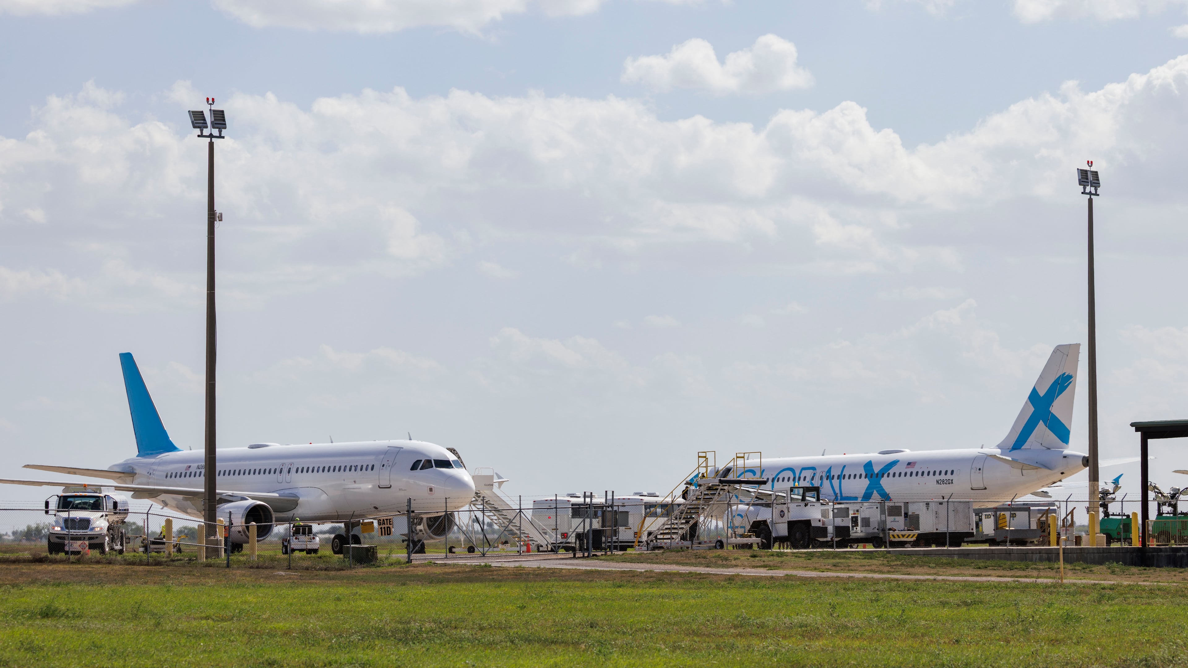 FILE - Planes used for deportation flights sit at the Valley International Airport, Aug. 31, 2025, in Harlingen, Texas. (AP Photo/Michael Gonzalez, File)