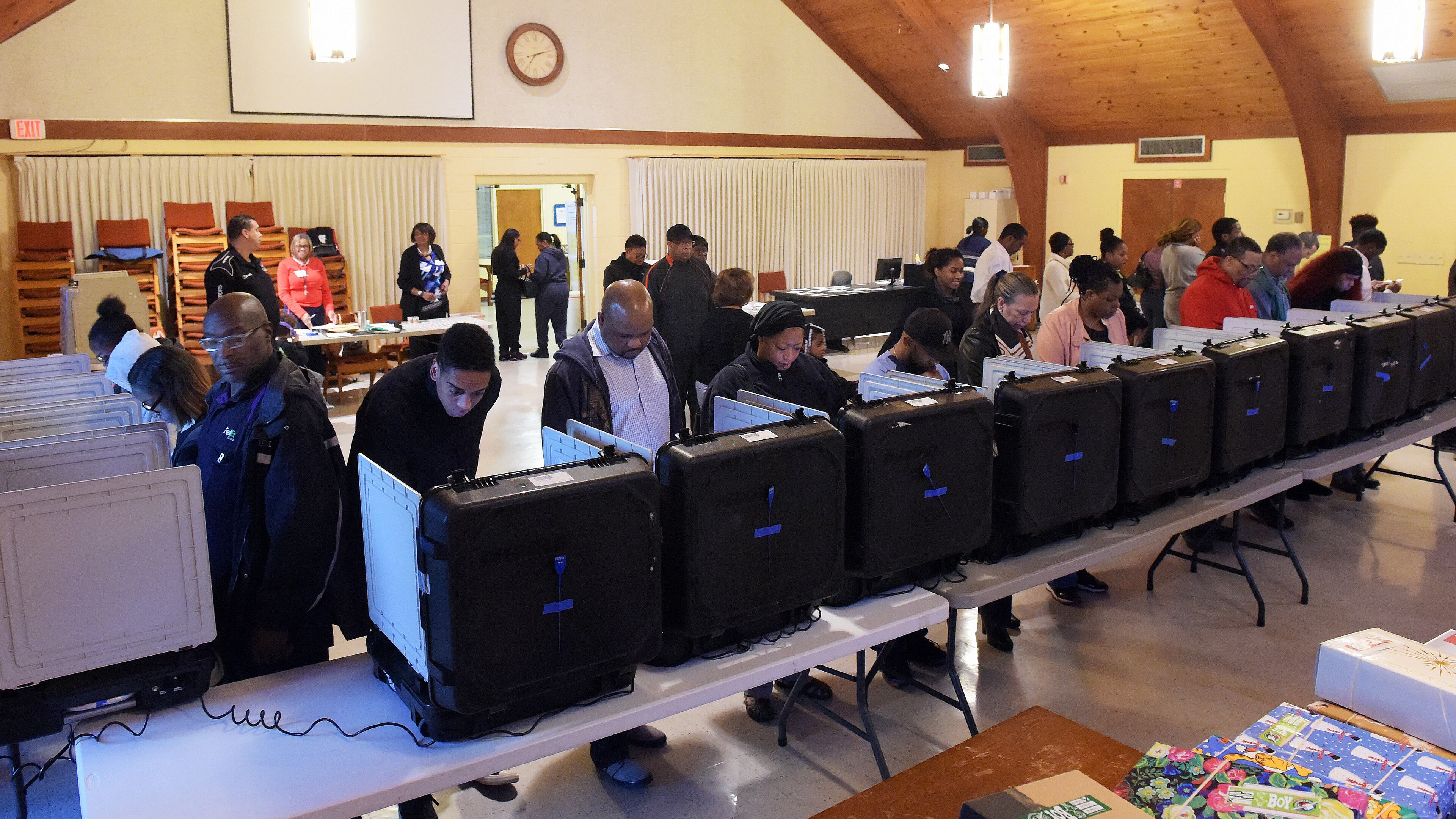 DeKalb County voters go to the polls on Election Day at the Crossroads Presbyterian Church on Tuesday. KENT D. JOHNSON / KDJOHNSON@AJC.com