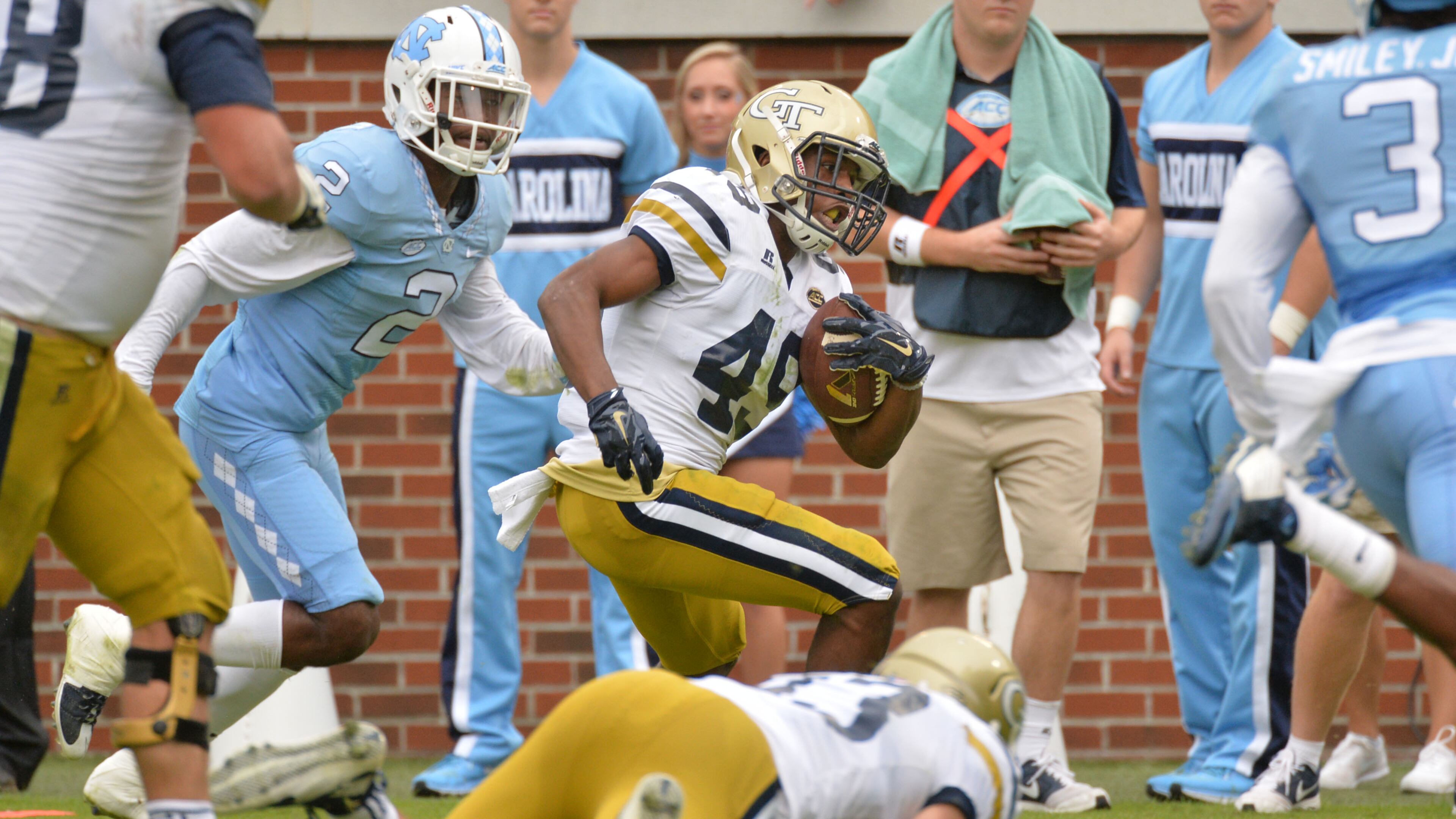 October 3, 2015 Atlanta - Georgia Tech Yellow Jackets running back Clinton Lynch (49) rushes for a touchdown against the North Carolina Tar Heels in the first half at Bobby Dodd Stadium on Saturday, October 3, 2015. HYOSUB SHIN / HSHIN@AJC.COM