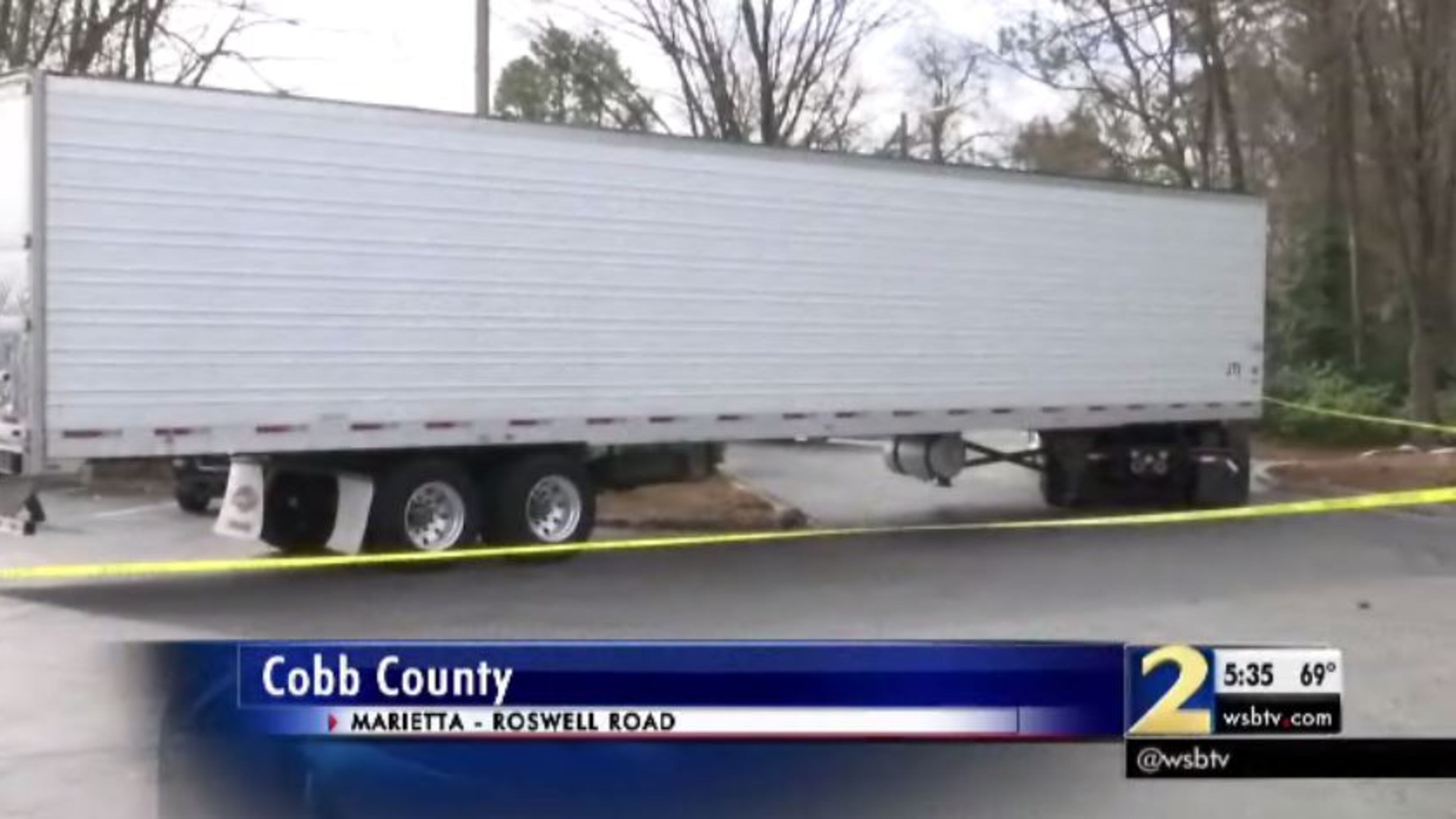 A tractor-trailer hit a man Monday morning in a parking lot on Roswell Road in Marietta. (Credit: Channel 2 Action News)