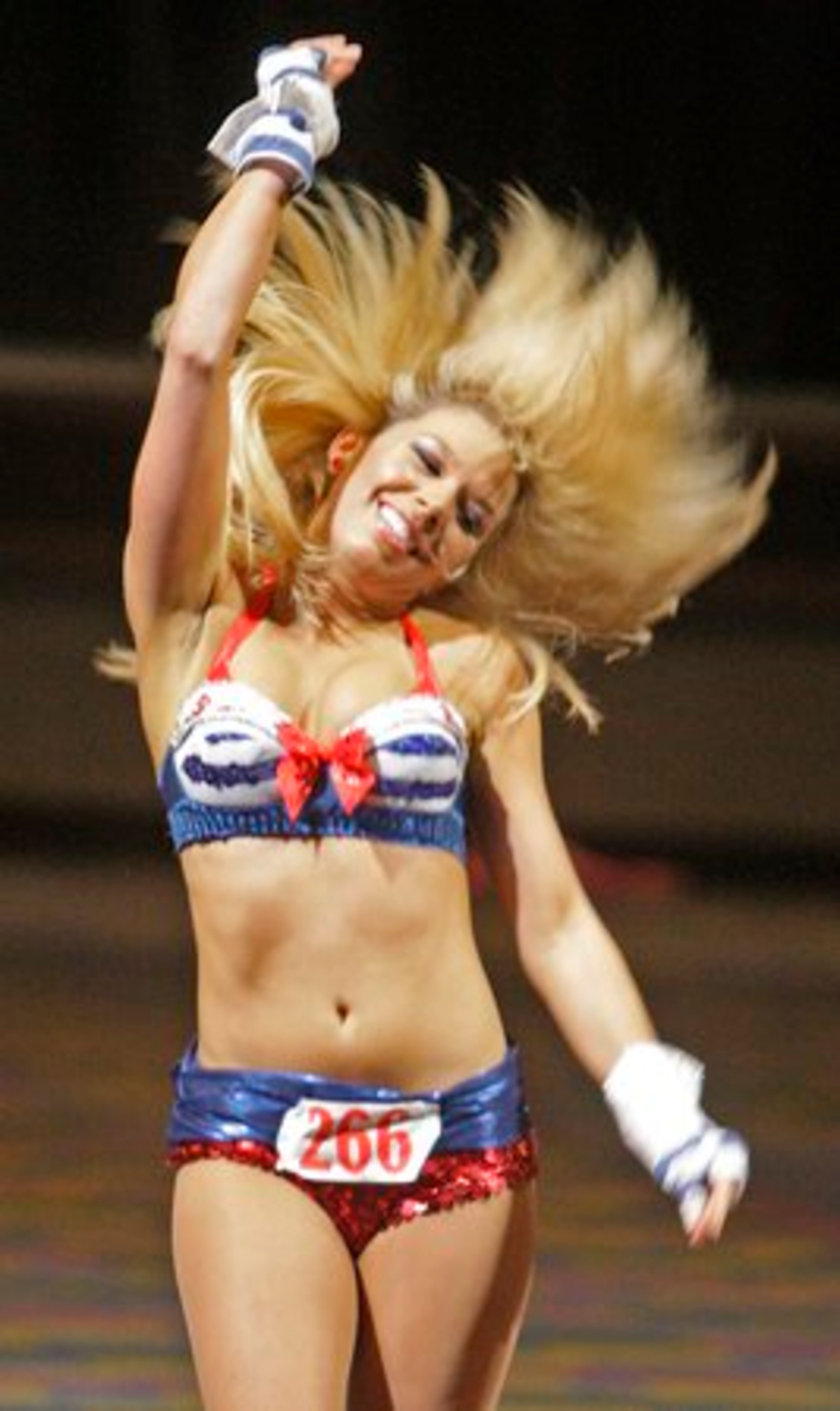 Her hair flying, Nikky Williams, 28, from Atlanta, performs during her semifinal audition.