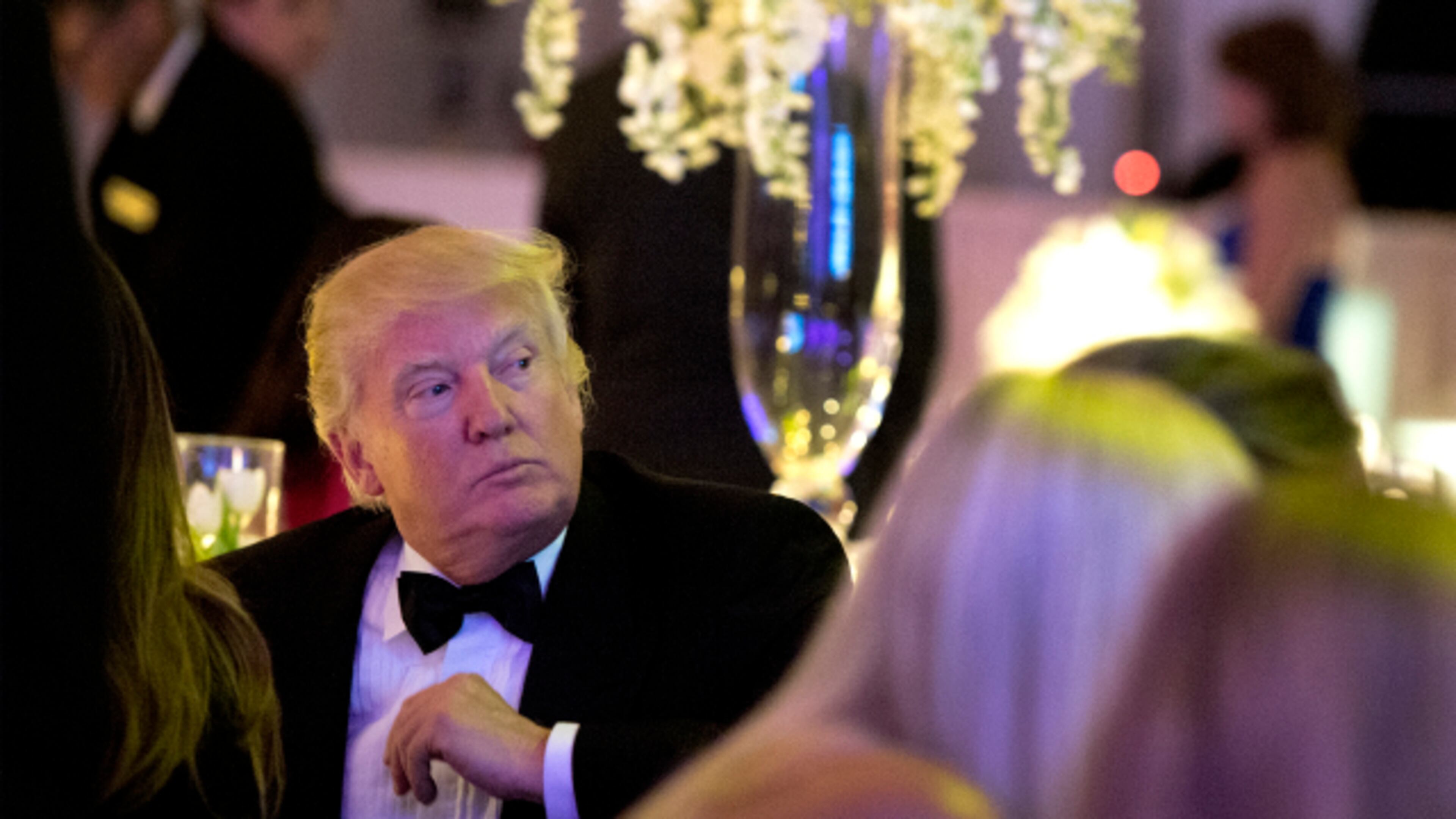 President-elect Donald Trump waits for midnight during the New Year's Eve Celebration at Mar-a-Lago Club Dec. 31, 2016.
