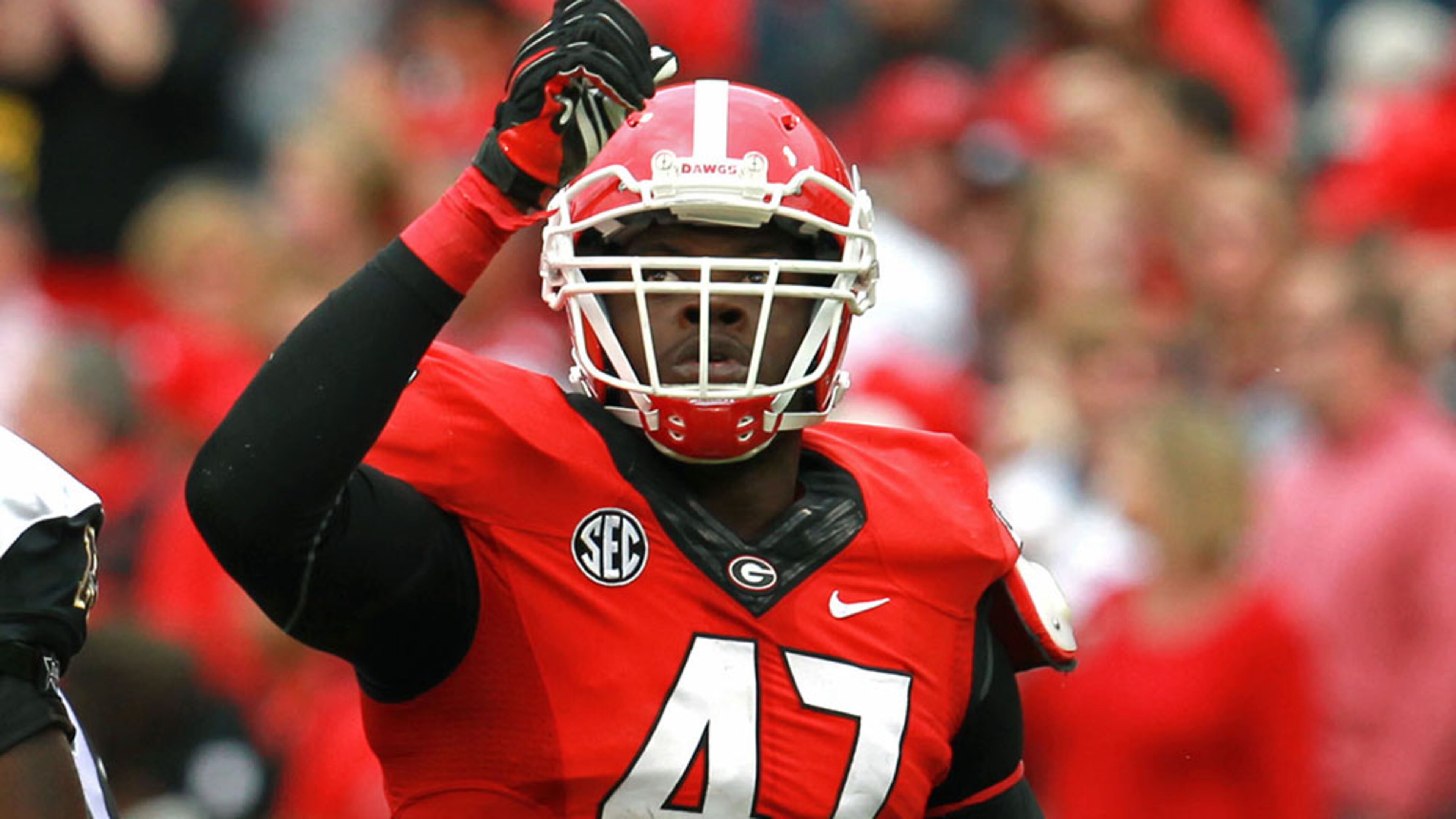 November 9, 2013 - Athens, Ga.: University of Georgia defensive end Ray Drew (47) celebrates his sack of Appalachian State quarterback Kameron Bryant in the second half of their game at Sanford Stadium in Athens, Ga., November 9, 2013. Georgia defeated Appalachian State 45-6. JASON GETZ / JGETZ@AJC.COM