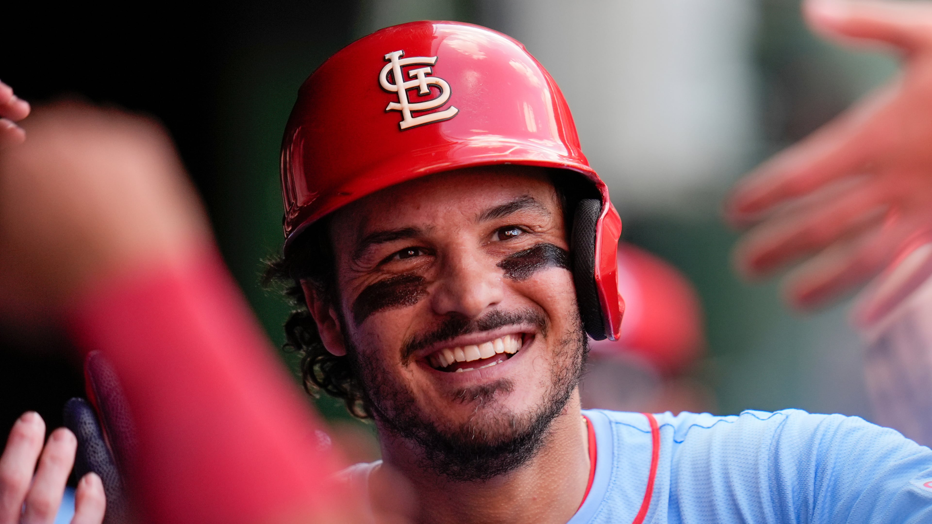 FILE - St. Louis Cardinals' Nolan Arenado celebrates in the dugout after hitting a home run during the fourth inning of a baseball game against the Chicago Cubs, Saturday, Sept. 27, 2025, in Chicago. (AP Photo/Erin Hooley, File)