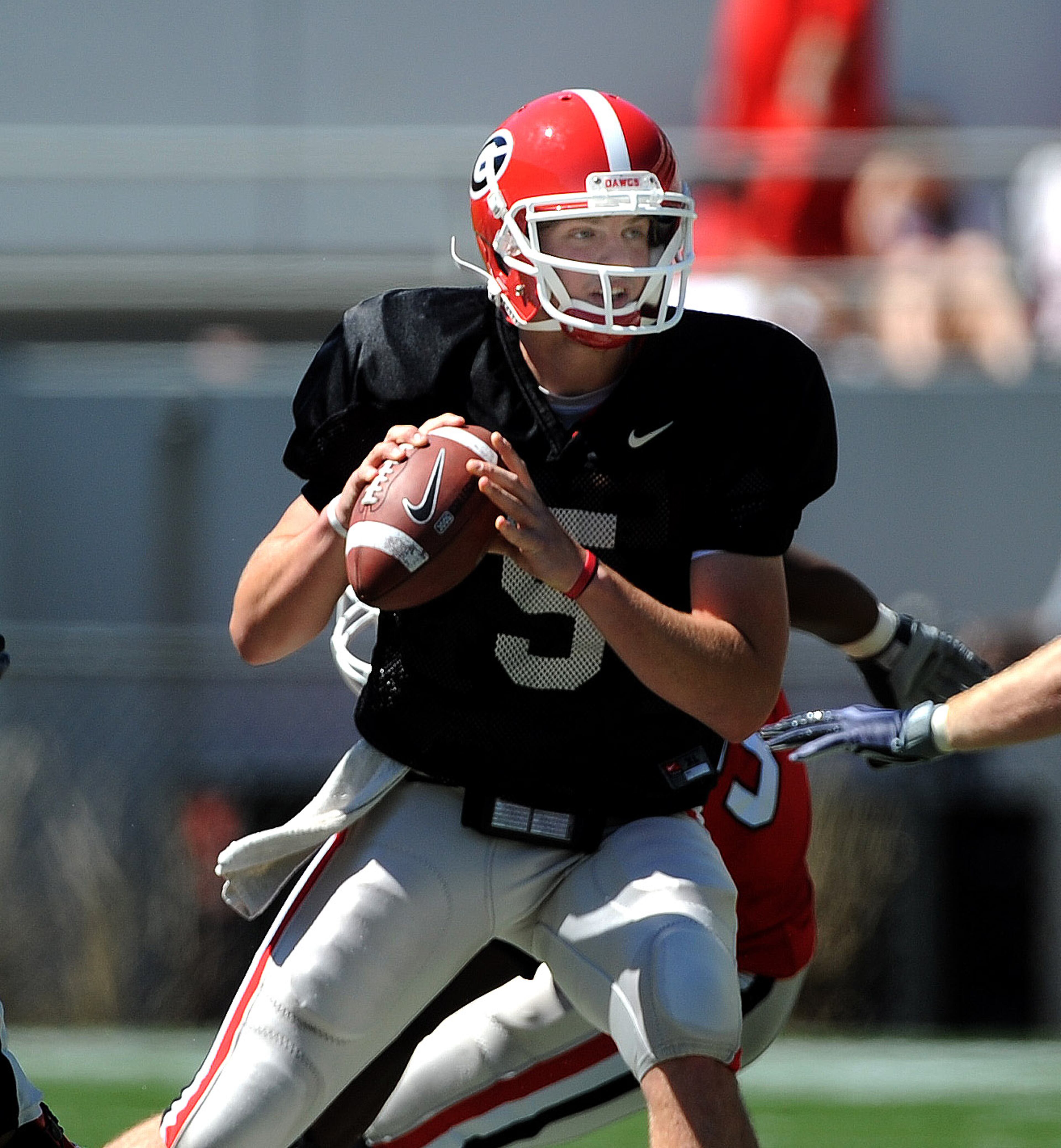 Quarterback Zach Mettenberger looks downfield for a receiver during the G-Day on Saturday, April 10, 2010 in Sanford Stadium.
