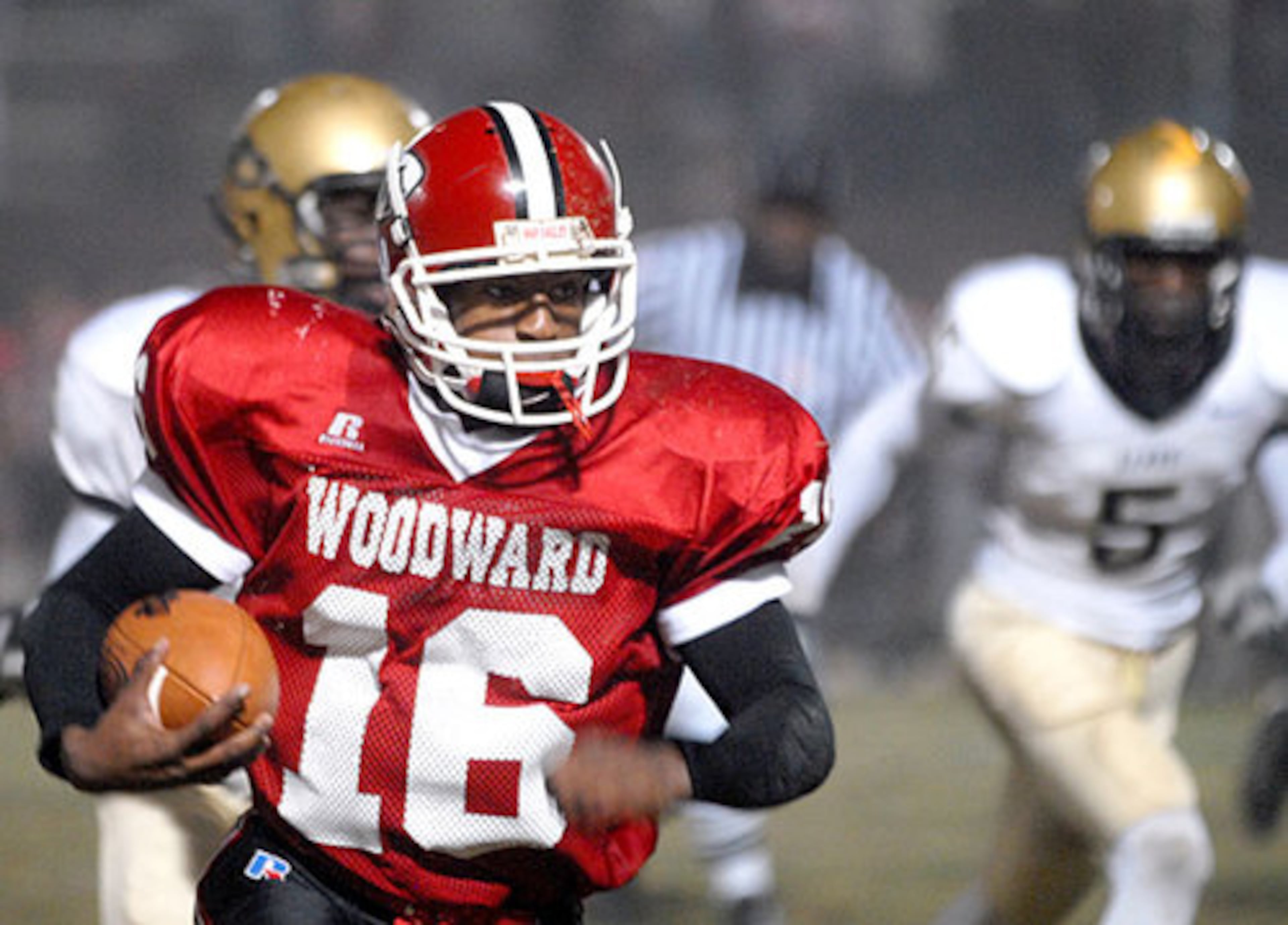 War Eagle Greg Patton (No. 16) carries.