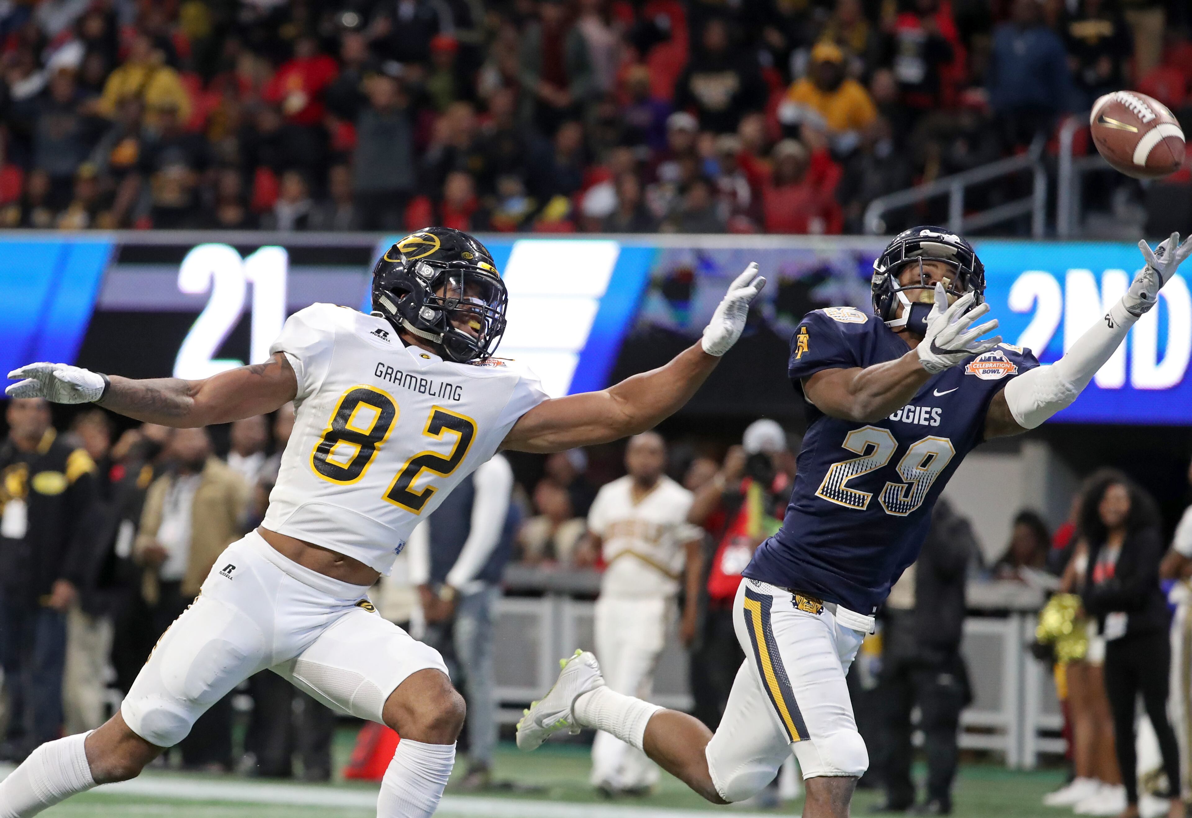 December 16, 2017 - Atlanta, Ga: North Carolina A&T Aggies defensive back Franklin McCain III (29) is unable to make the interception against Grambling State Tigers wide receiver Devante Davis (82) in the second half of the Celebration Bowl football game at Mercedes-Benz Stadium Saturday, December 16, 2017, in Atlanta. North Carolina A&T Aggies won 21-14. PHOTO / JASON GETZ