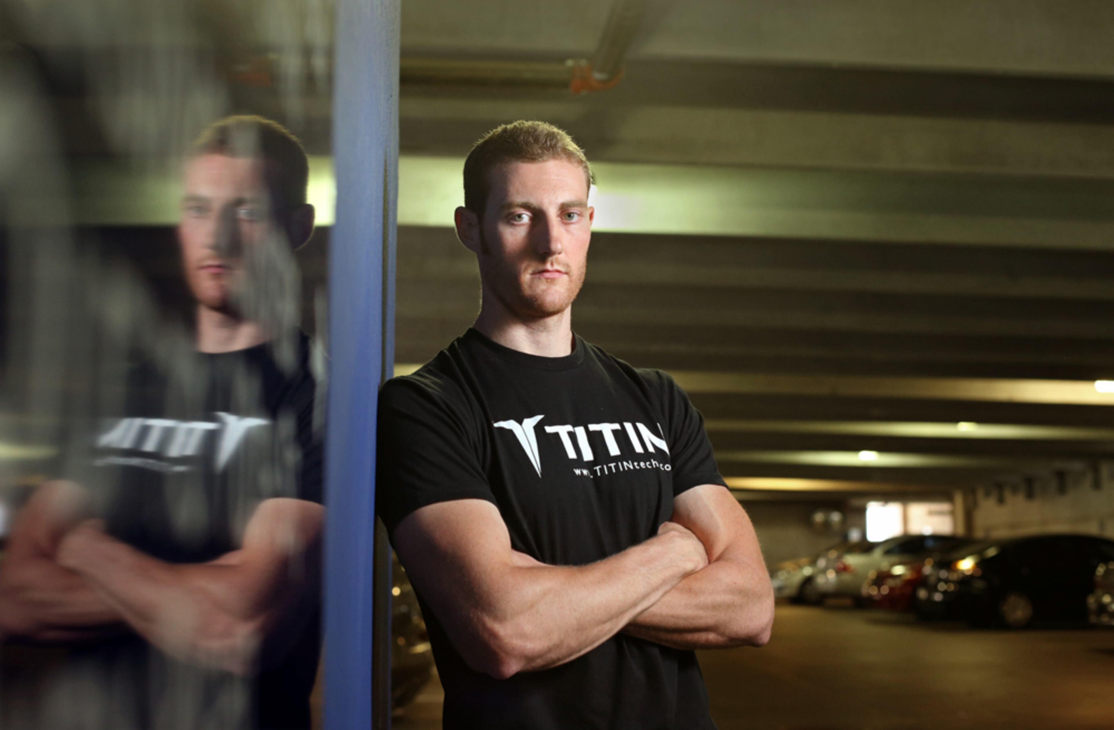 PRINT PRIORITY. May 13, 2013 - Atlanta, Ga: Patrick Whaley, Founder/CEO of Titin, stands at the site of the parking deck where he got shot over four years ago on May 4, 2009 close to the intersection of 10th Street and Northside Drive Tuesday afternoon in Atlanta, Ga., May 13, 2013. AJC Staff Photographer Jason Getz said, "My favorite story of the year was this one about Patrick Whaley. As a part of the Personal Journey series, Helena Oliveria and I spent countless hours telling Patrick�s story of survival and success. To lead the package I planned to take Whaley back to the site where he was shot. I interviewed Whaley re-enacting the story of how and where he was shot. The portrait that I made of Whaley in the parking lot seemed to be a fitting lead for the project. Even though the portrait of Whaley is very simply lit and executed, it�s a powerful photograph of where he is and how these events shaped Whaley into the person he is today. Whaley had a profound quote about his experience. Whaley said, "Being shot gave me a whole different outlook on life. It showed me that life is precious, and if you don't enjoy what you do then why are you doing it? If you pass away tomorrow, would you be satisfied where you are today?" JASON GETZ / JGETZ@AJC.COM