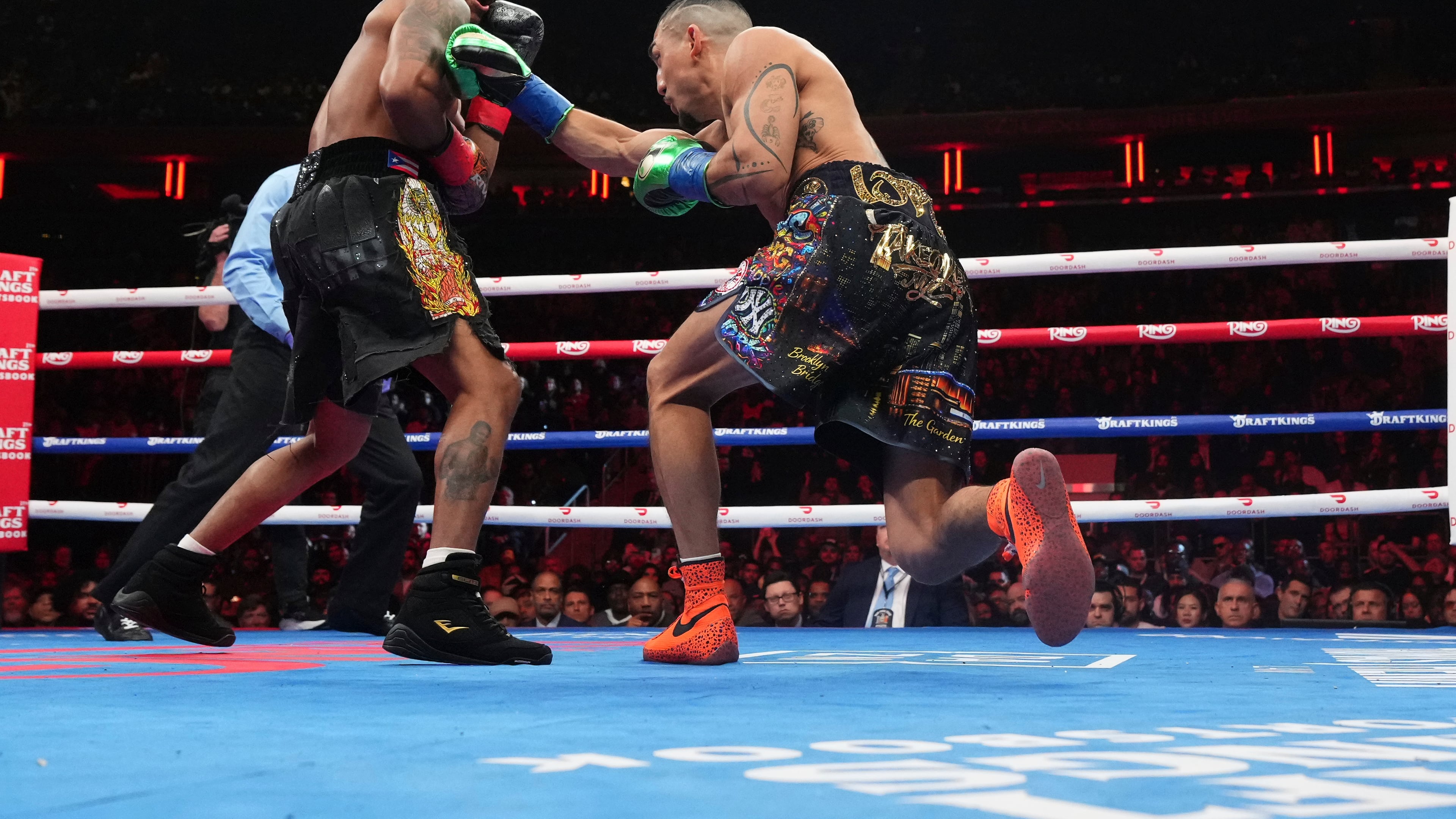 Shadur Stevenson, left, fights Teofimo Lopez during a super lightweight title boxing match Sunday, Feb. 1, 2026, in New York. (AP Photo/Frank Franklin II)