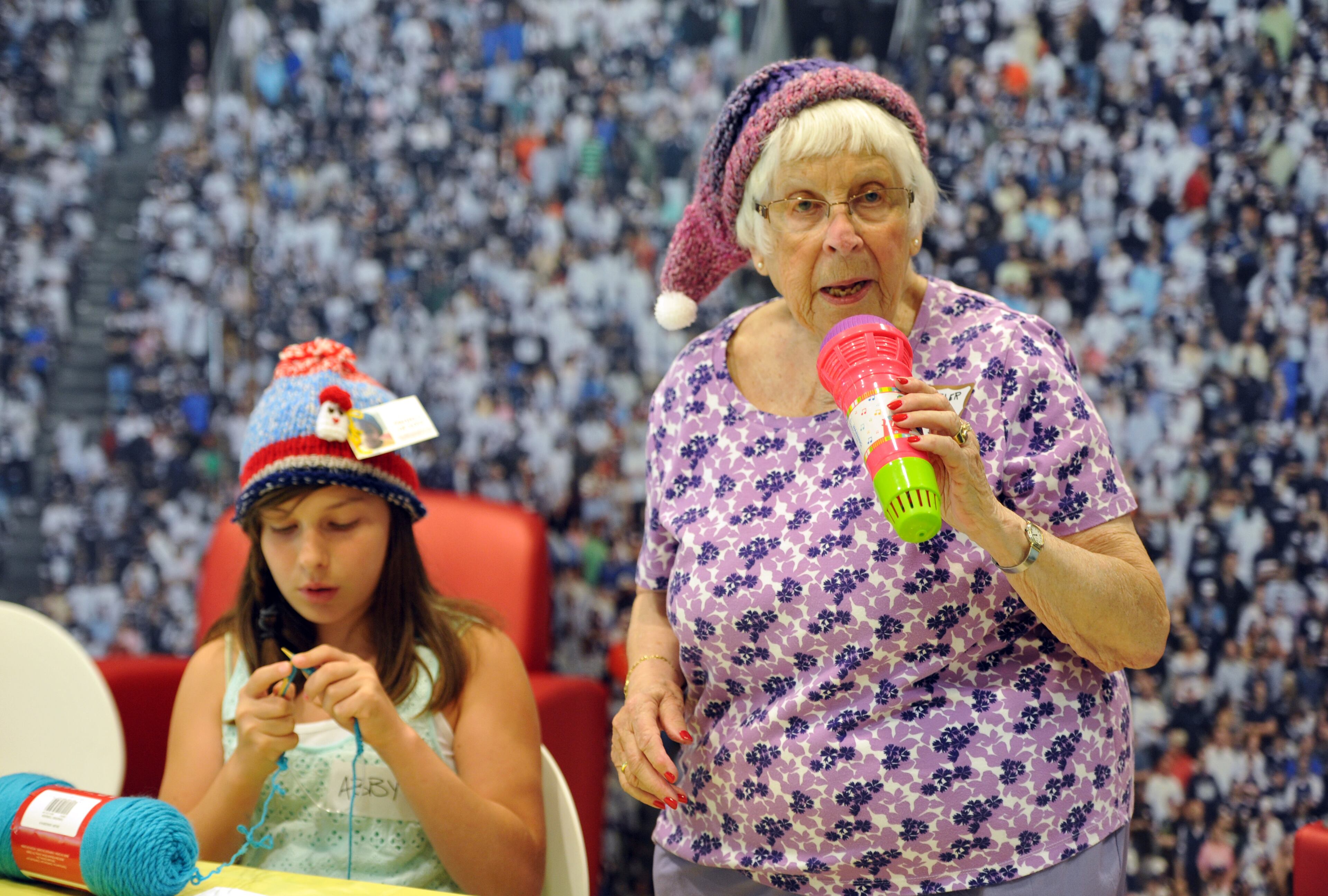 Betty Golden entertains patients as she visits to meet patients at Children's Healthcare of Atlanta on Wednesday, May 28, 2014. After her husband died in November 2008, Betty Golden, decided to knit 63 caps in memory of her husband - one cap for every year they were married. She donated the knitted hats to be given to children in hospitals and shelters. HYOSUB SHIN / HSHIN@AJC.COM