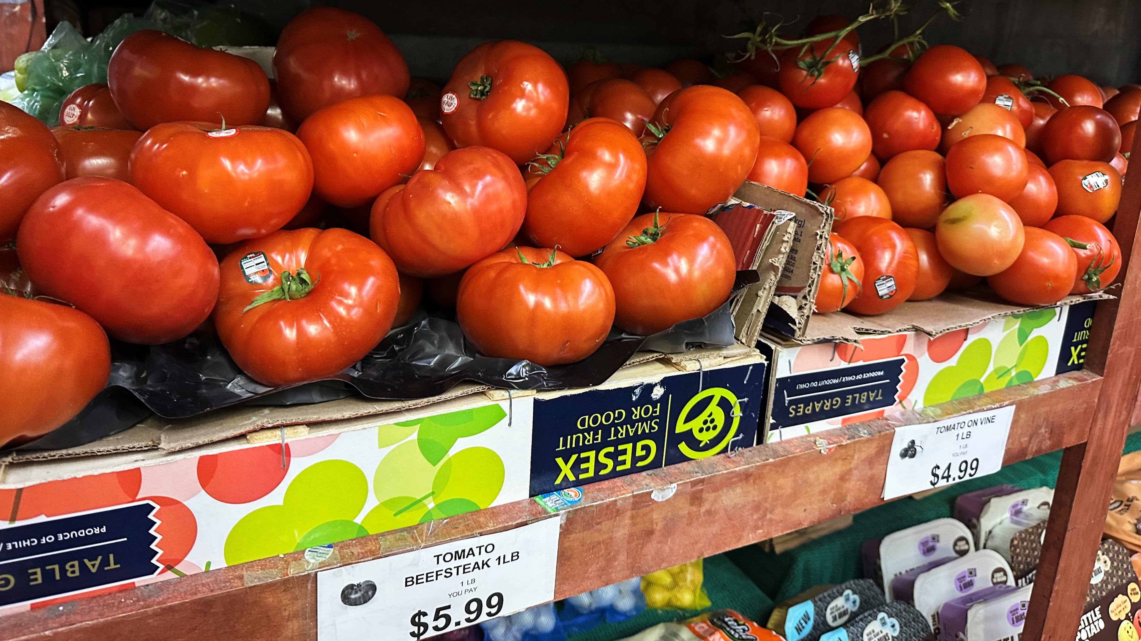 Tomatoes await customers on the shelves of a supermarket in New York on Tuesday, May 26, 2026. (AP Photo/Matt Sedensky)
