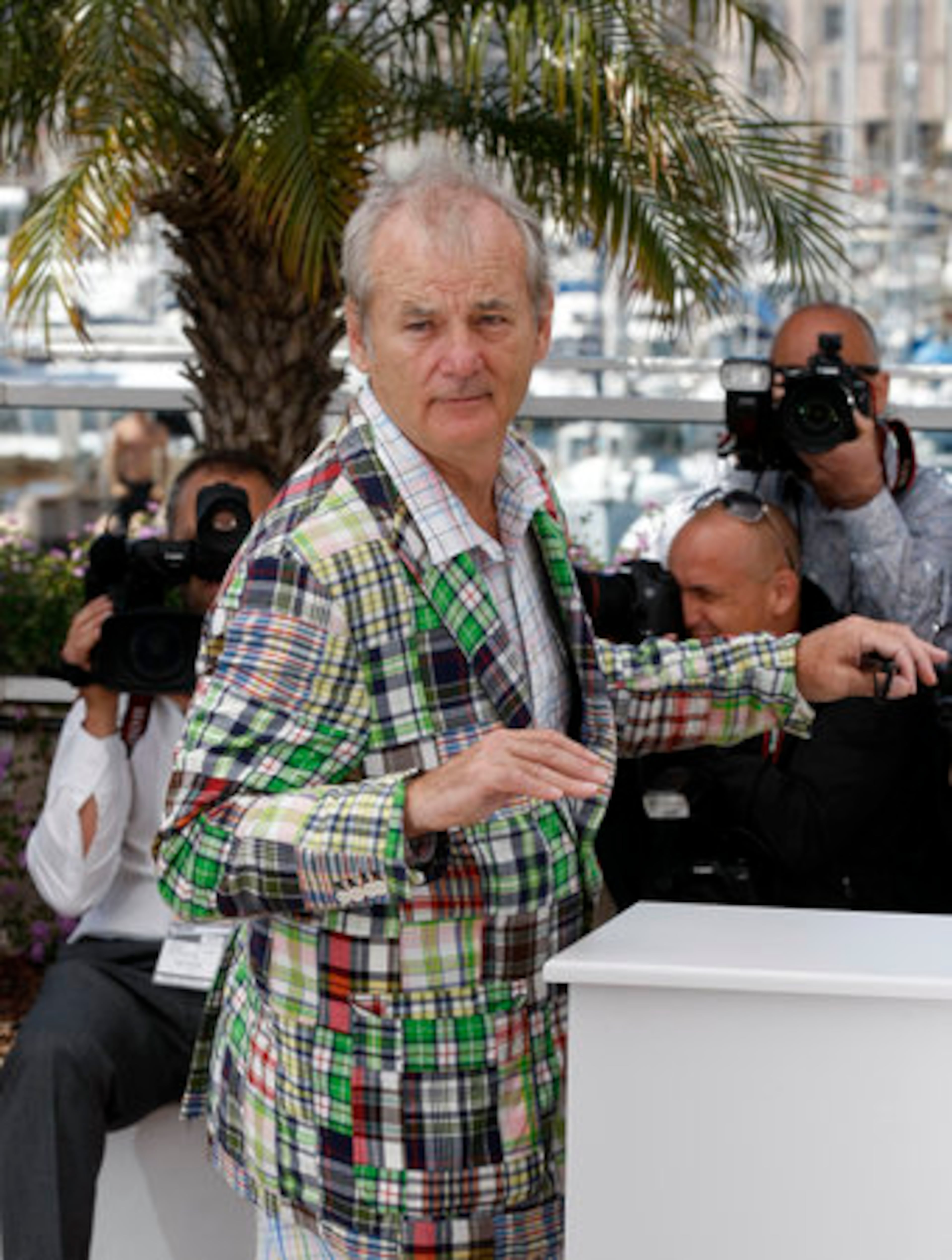 Comedian Bill Murray made light of the photo call dancing around the podium.