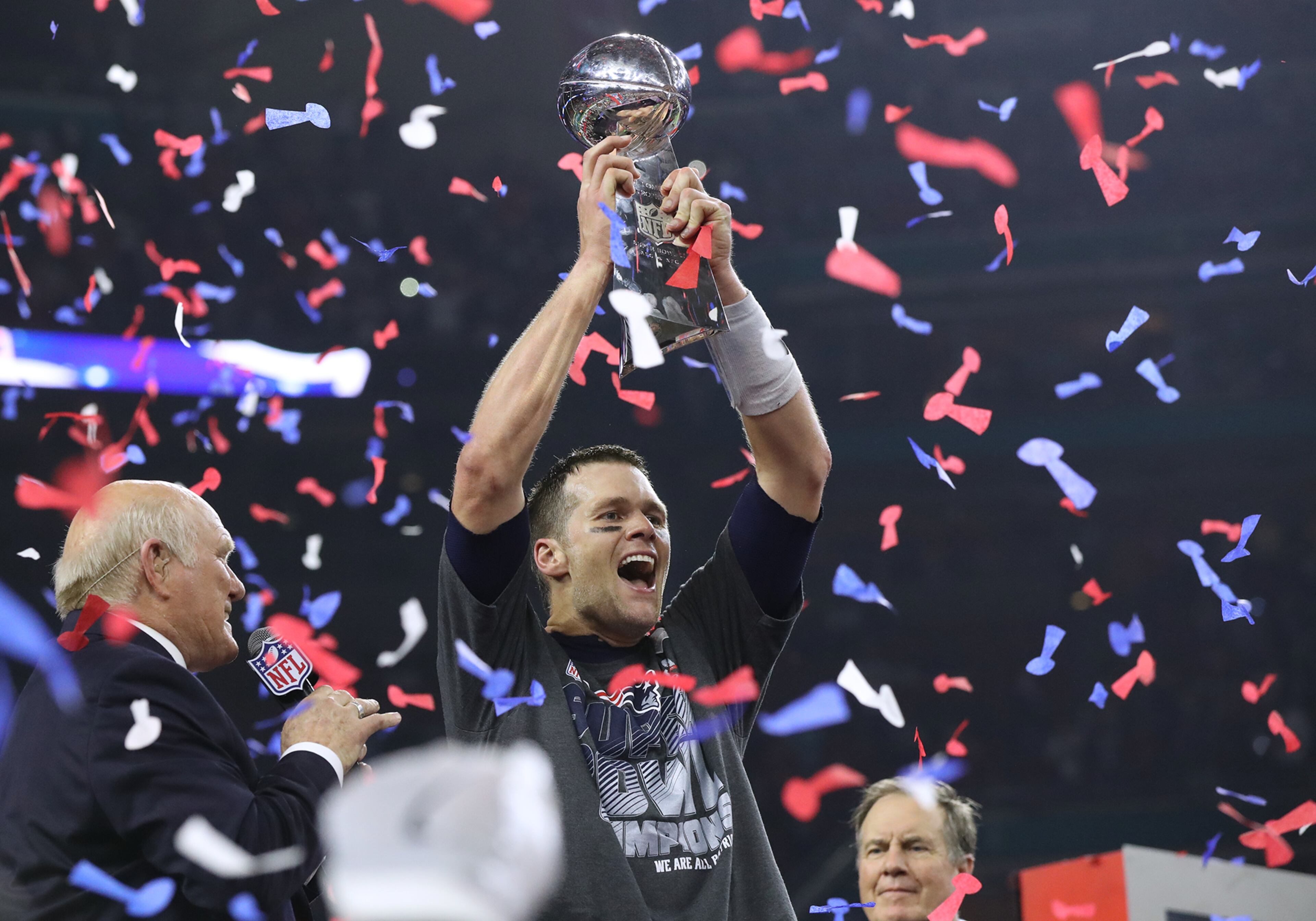 February 5, 2017, Houston: Tom Brady hoists the Lombardi Trophy winning his fifth ring as the Patriots beat the Falcons 34-28 to win the Super Bowl on Sunday Feb. 5, 2017, in Houston. Curtis Compton/ccompton@ajc.com