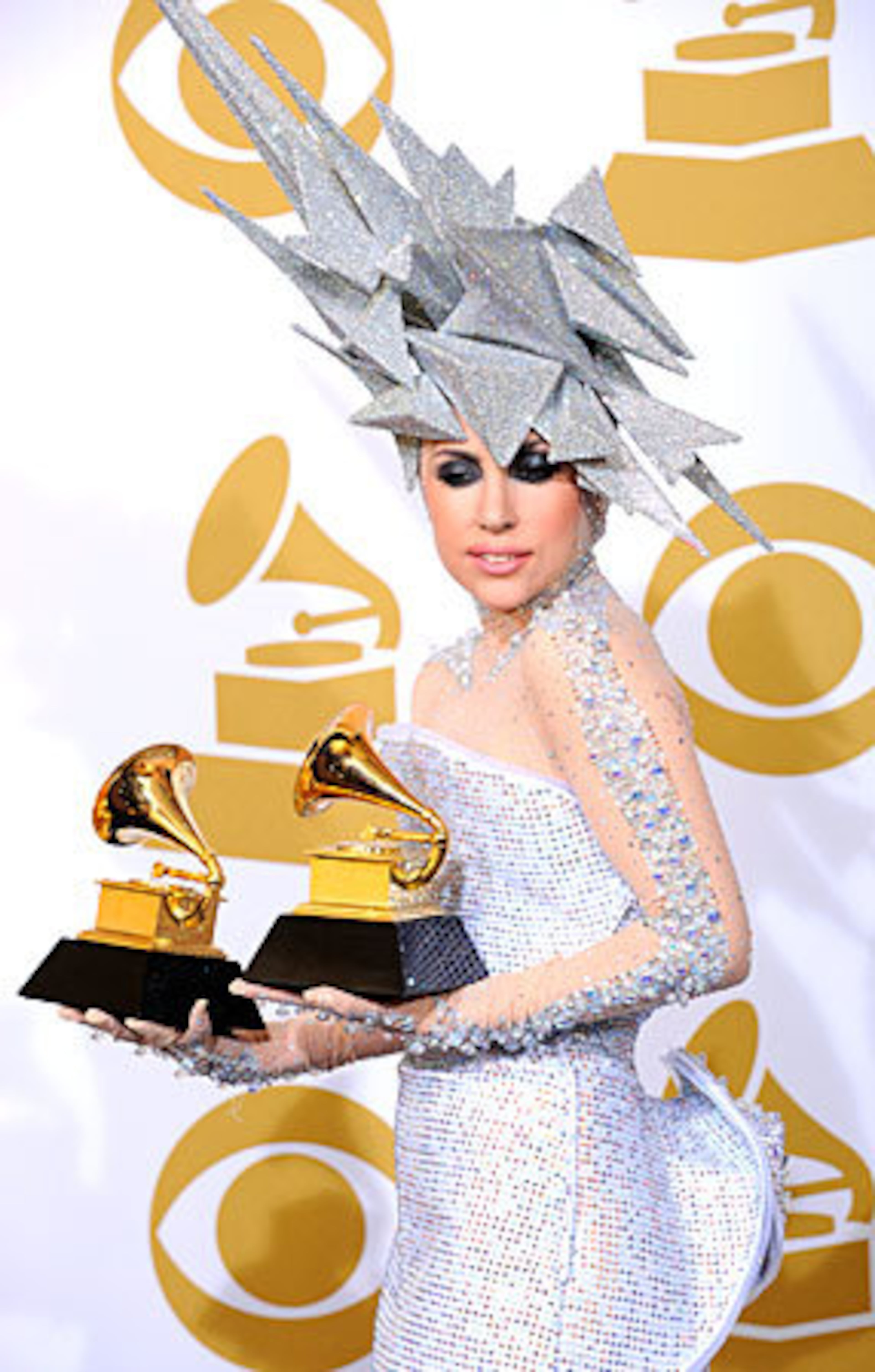 Another big glittery, asymmetrical pointy-hair thingee? This is Gaga phoning it in.