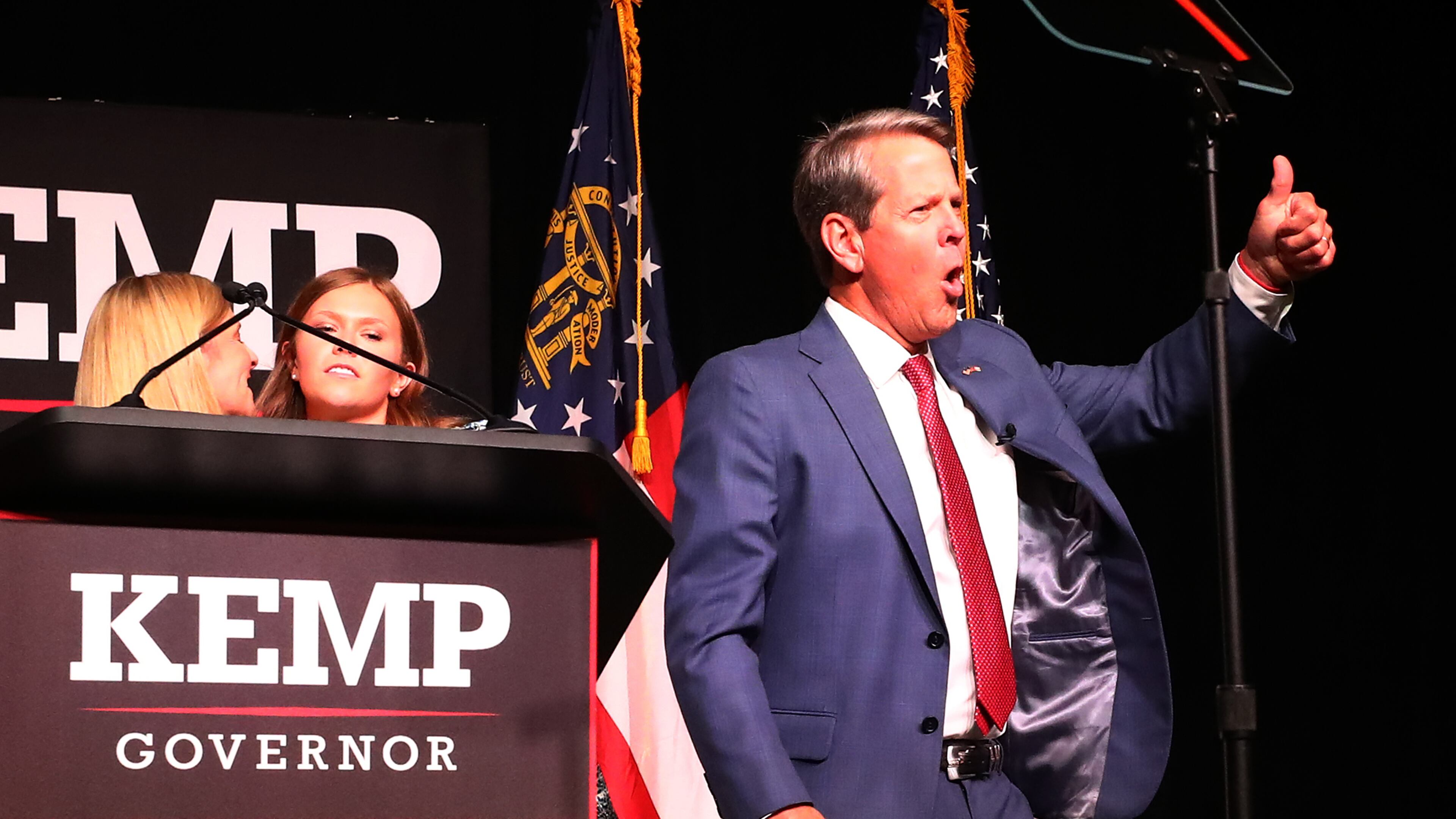 052422 Atlanta: Governor Brian Kemp reacts to cheering supporters as he take the stage to deliver his election night party speech at the College Football Hall of Fame on Tuesday, May 24, 2022, in Atlanta. “Curtis Compton / Curtis.Compton@ajc.com”