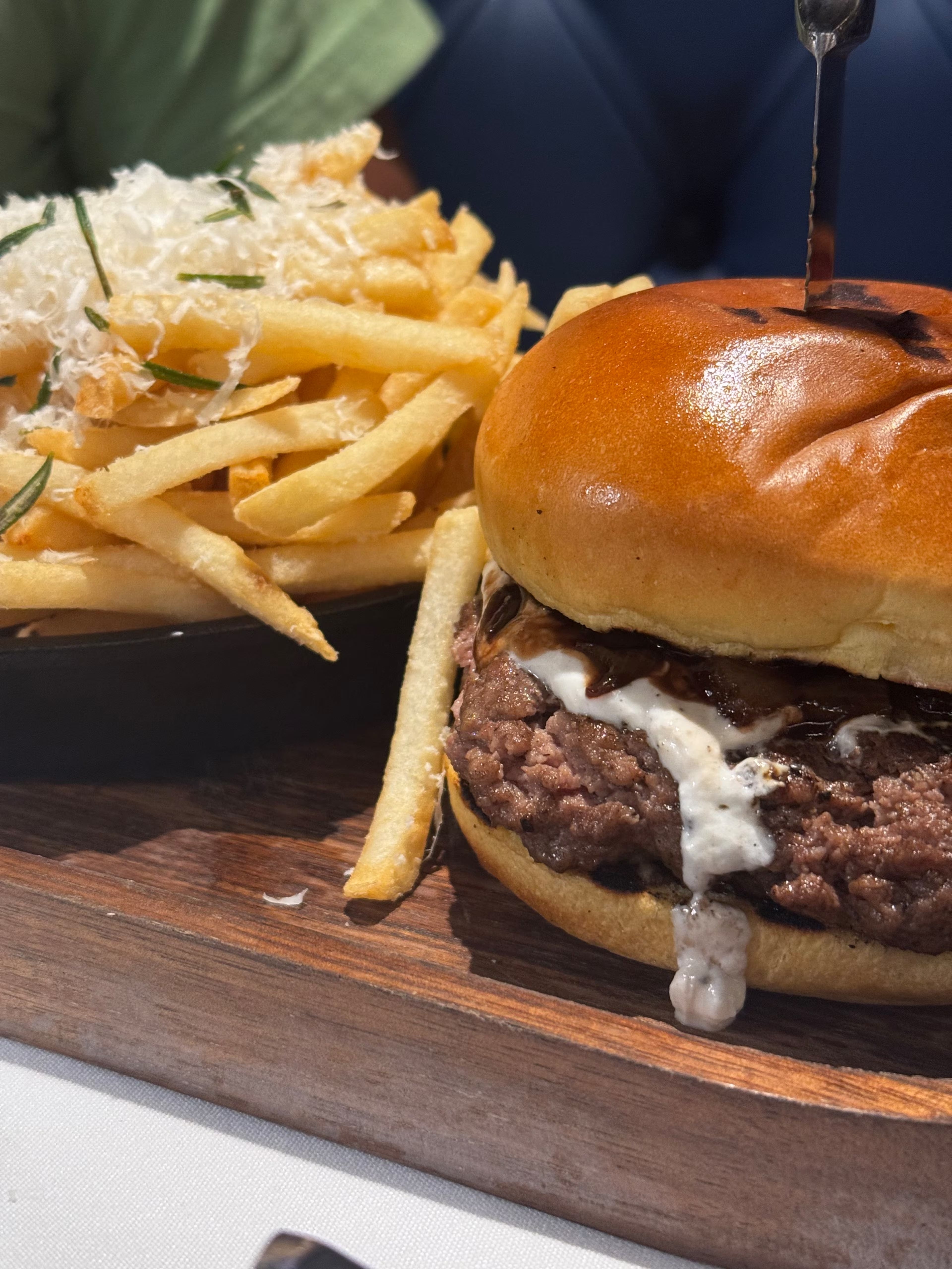 Enzo's burger topped with goat cheese, fig preserves and caramelized onion. (Courtesy of Justin Brown)