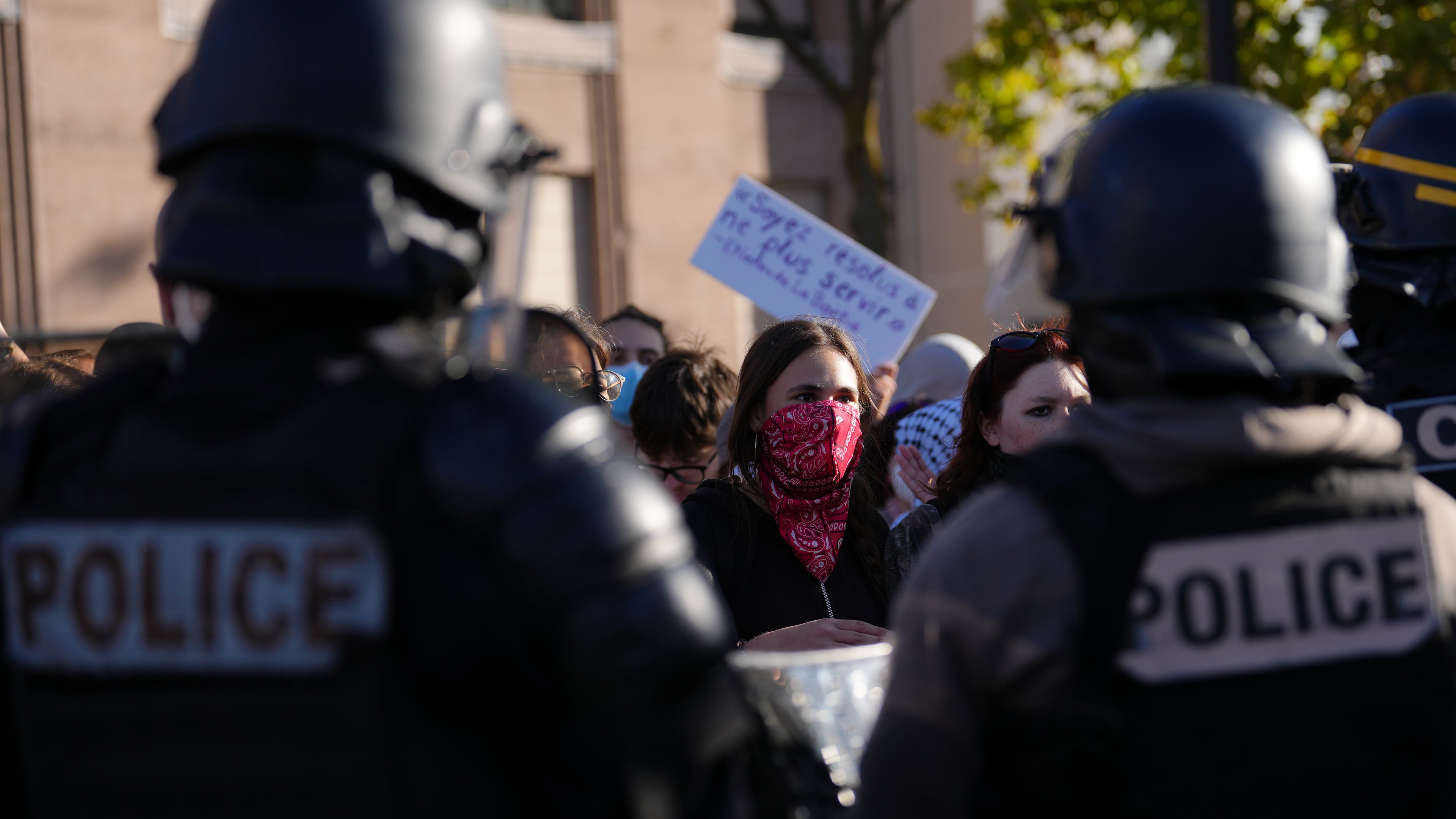 Students face police officers in front of the Helene Boucher high School during a protest against under-resourced schools, in Paris, Thursday Oct. 8, 2026. (AP Photo/Aurelien Morissard)