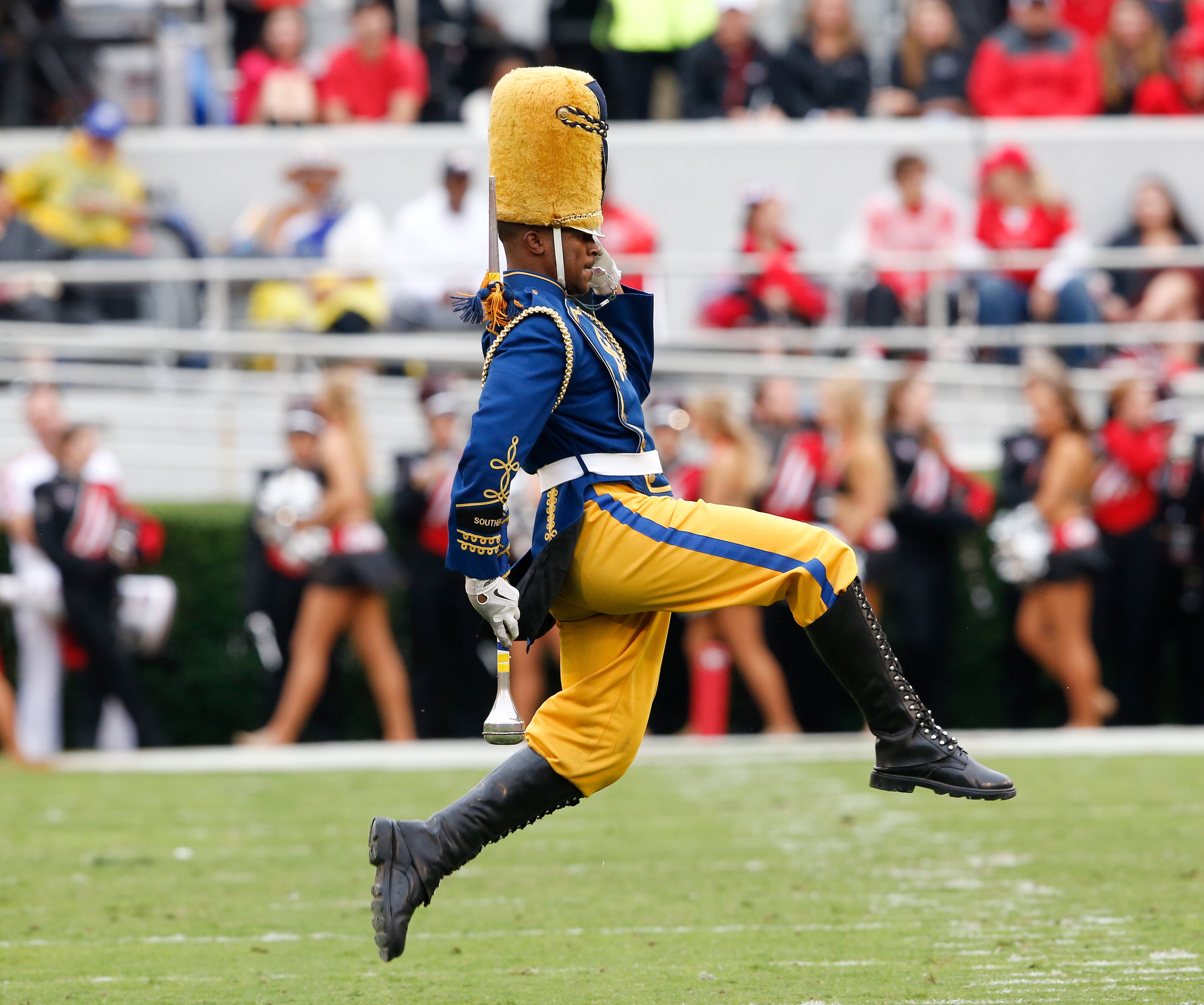 Southern drum major Keith Morgan, of New Orleans, preforms at halftime in an NCAA college football game against Georgia Saturday, Sept. 26, 2015, in Athens, Ga. (AP Photo/John Bazemore)