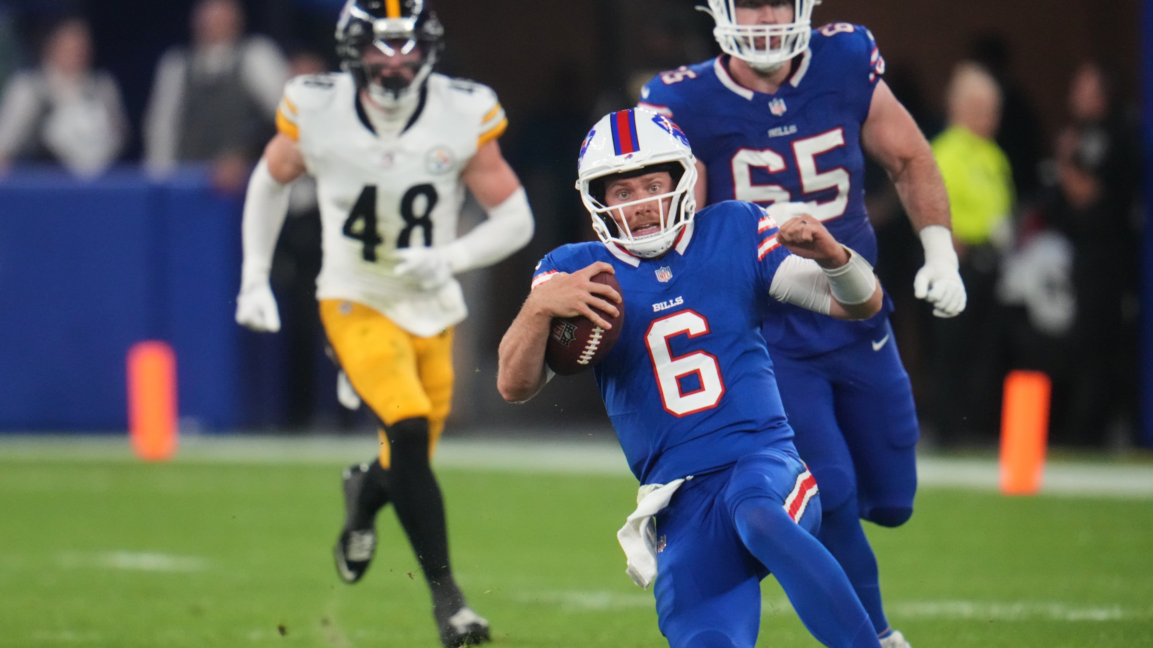 Buffalo Bills quarterback Shane Buechele (6) runs the ball for a short gain in the second half of a preseason NFL football game against the Pittsburgh Steelers in Orchard Park, NY., Thursday, Aug. 27, 2026. (AP Photo/Gene J. Puskar)