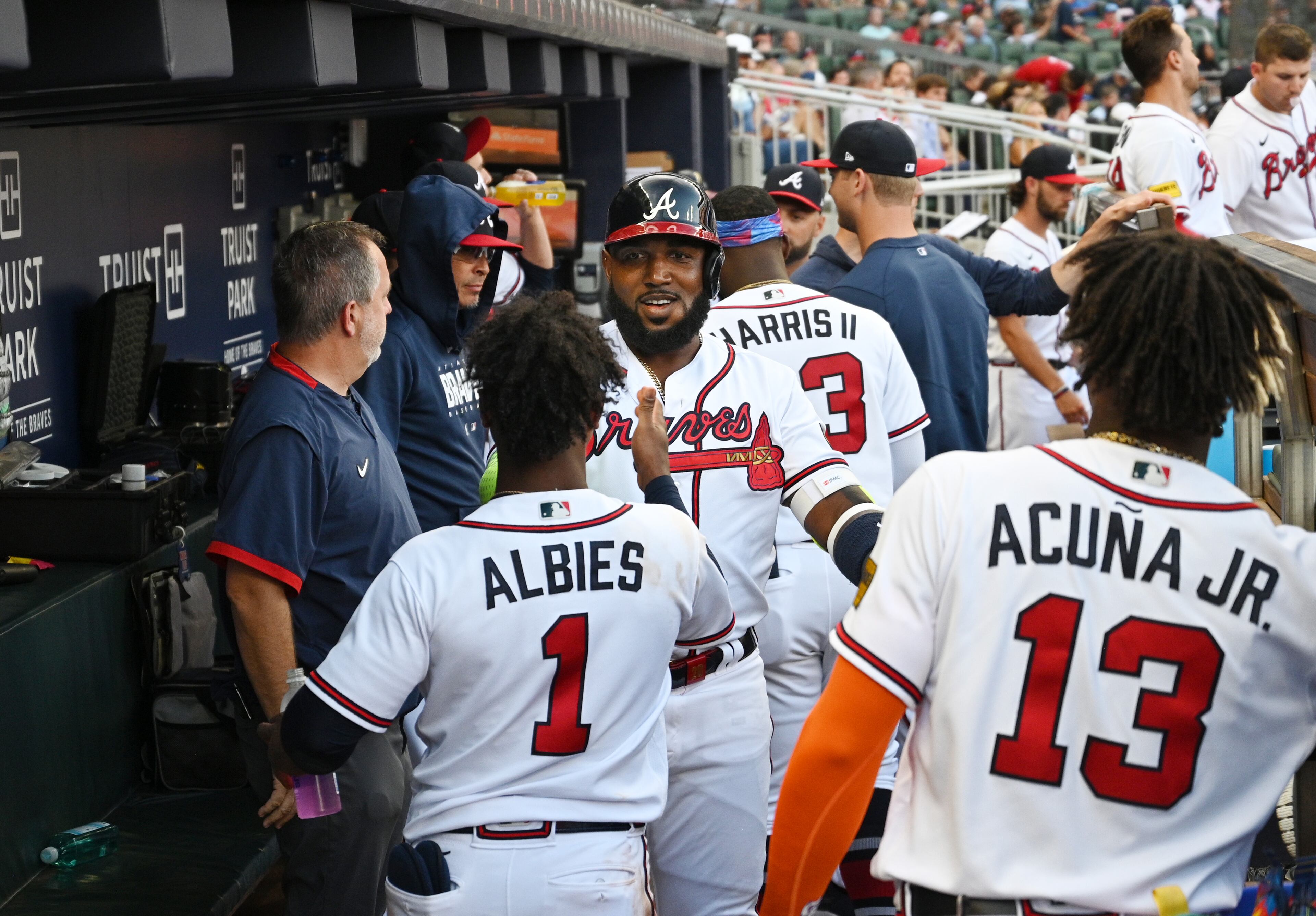 Atlanta Braves' designated hitter Marcell Ozuna (20) celebrates with teammates after hitting a solo home run during the second inning at Truist Park, Wednesday, July 19, 2023, in Atlanta. (Hyosub Shin / Hyosub.Shin@ajc.com)