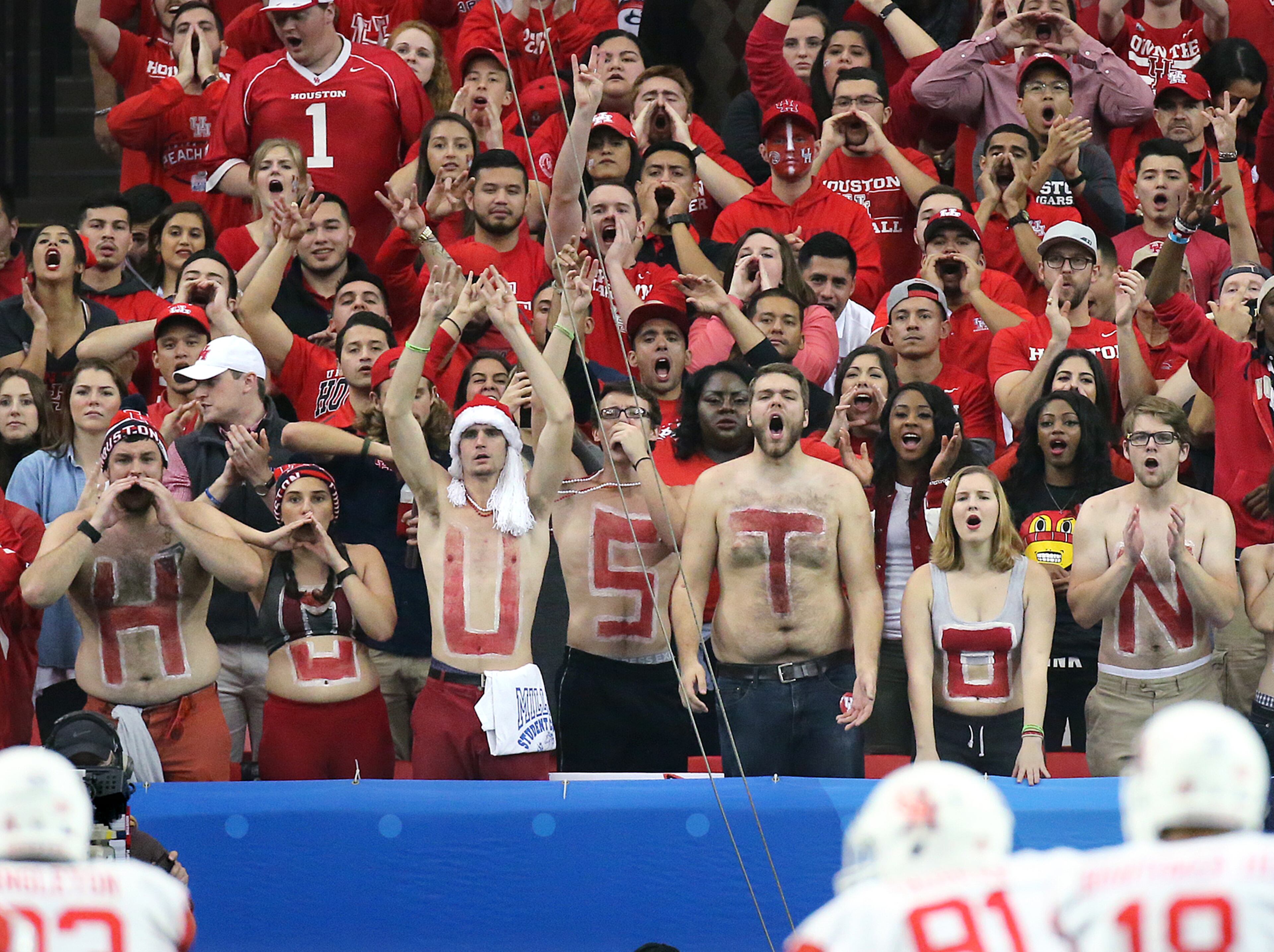 Houston fans cheer on their team to a 38-24 victory over Florida State during the Chick-fil-A Peach Bowl football game on Thursday, December 31, 2015, in Atlanta. Curtis Compton / ccompton@ajc.com