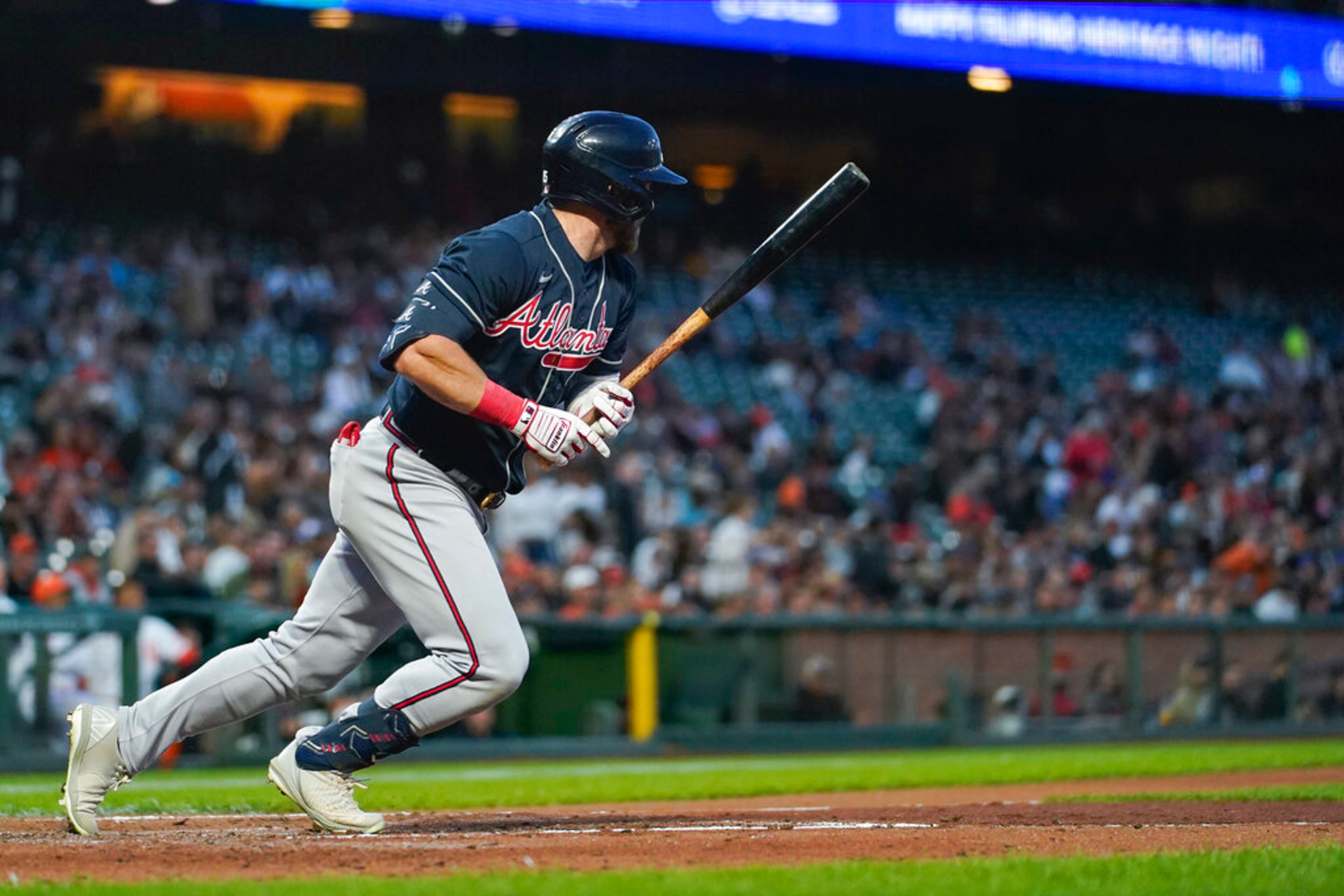 Atlanta Braves’ Robbie Grossman hits a grounder on which Eddie Rosario was forced out at second against the San Francisco Giants during the second inning of a baseball game in San Francisco, Tuesday, Sept. 13, 2022. Michael Harris II scored from third on the play, and Grossman was safe at first. (AP Photo/Godofredo A. Vásquez)