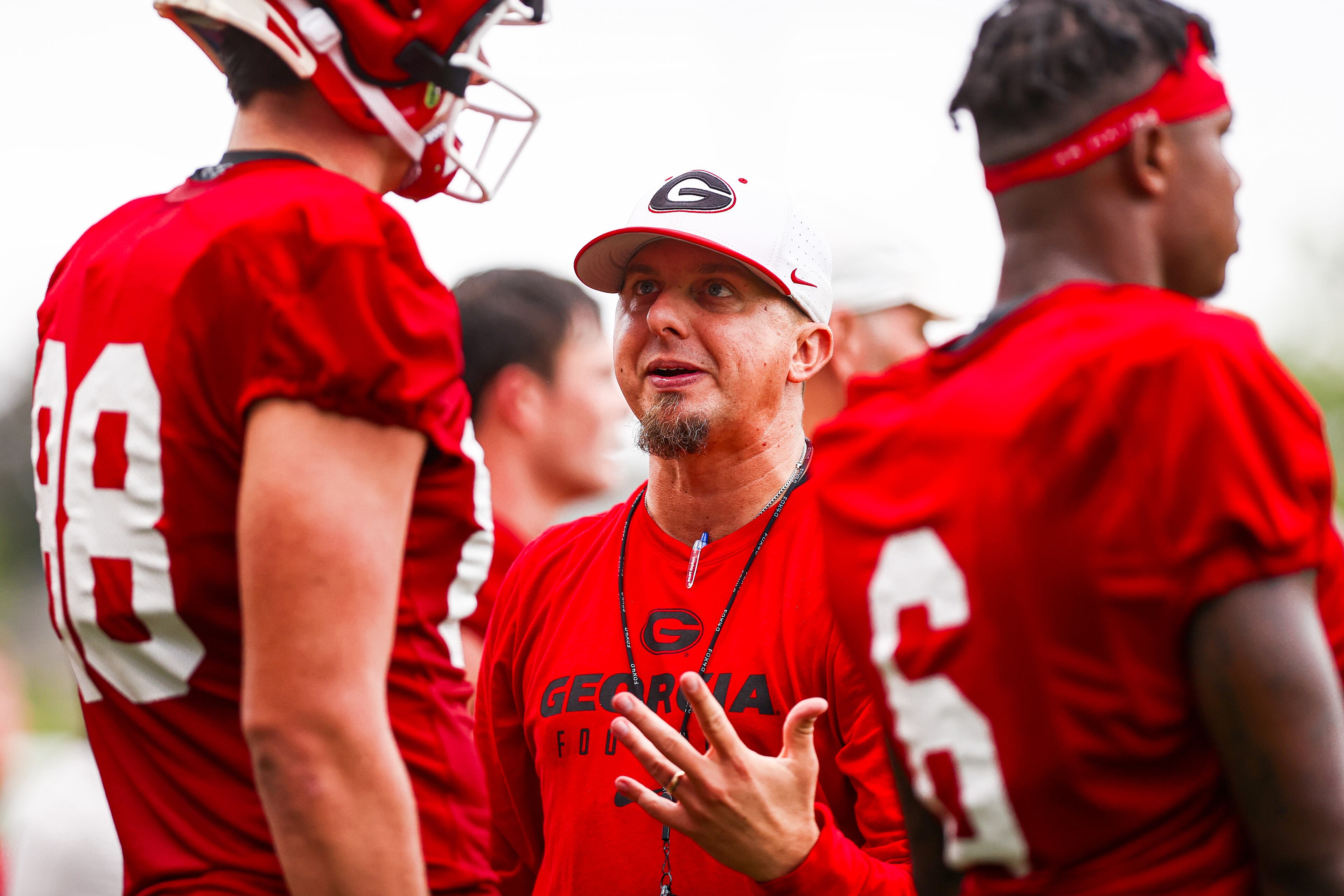 Georgia tight ends coach Todd Hartley talks to players. (Tony Walsh/UGAAA)