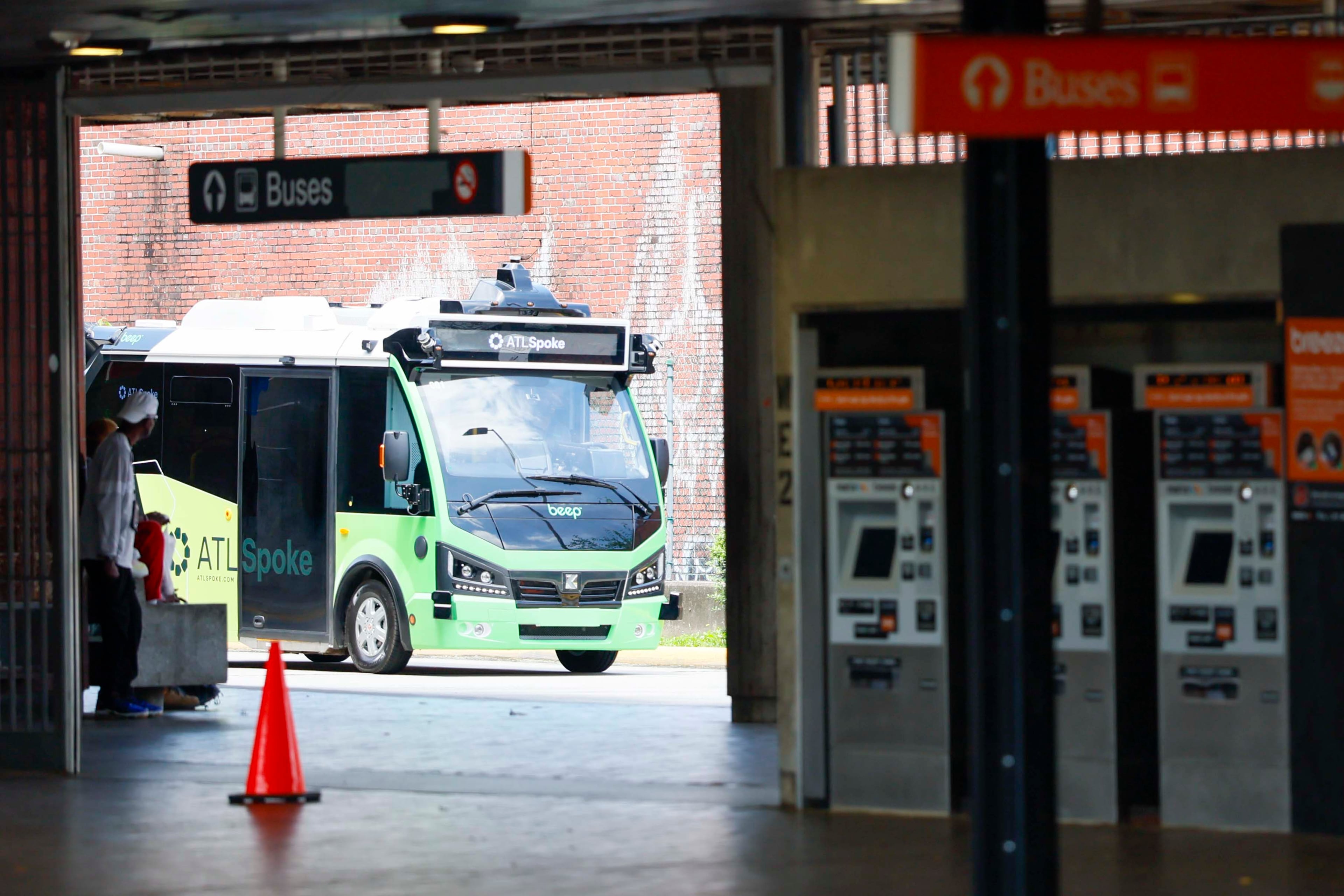 An ATL Spoke bus is arriving at the West End MARTA Station on Monday, June 1, 2026. The ATL Spoke autonomous pilot program’s first route connects the Beltline Southwest Trail with MARTA Rail. There are stops at MARTA West End Station, Joseph E. Lowery Blvd at Beecher Street, and two stops within the Lee + White district. (Miguel Martinez/AJC)