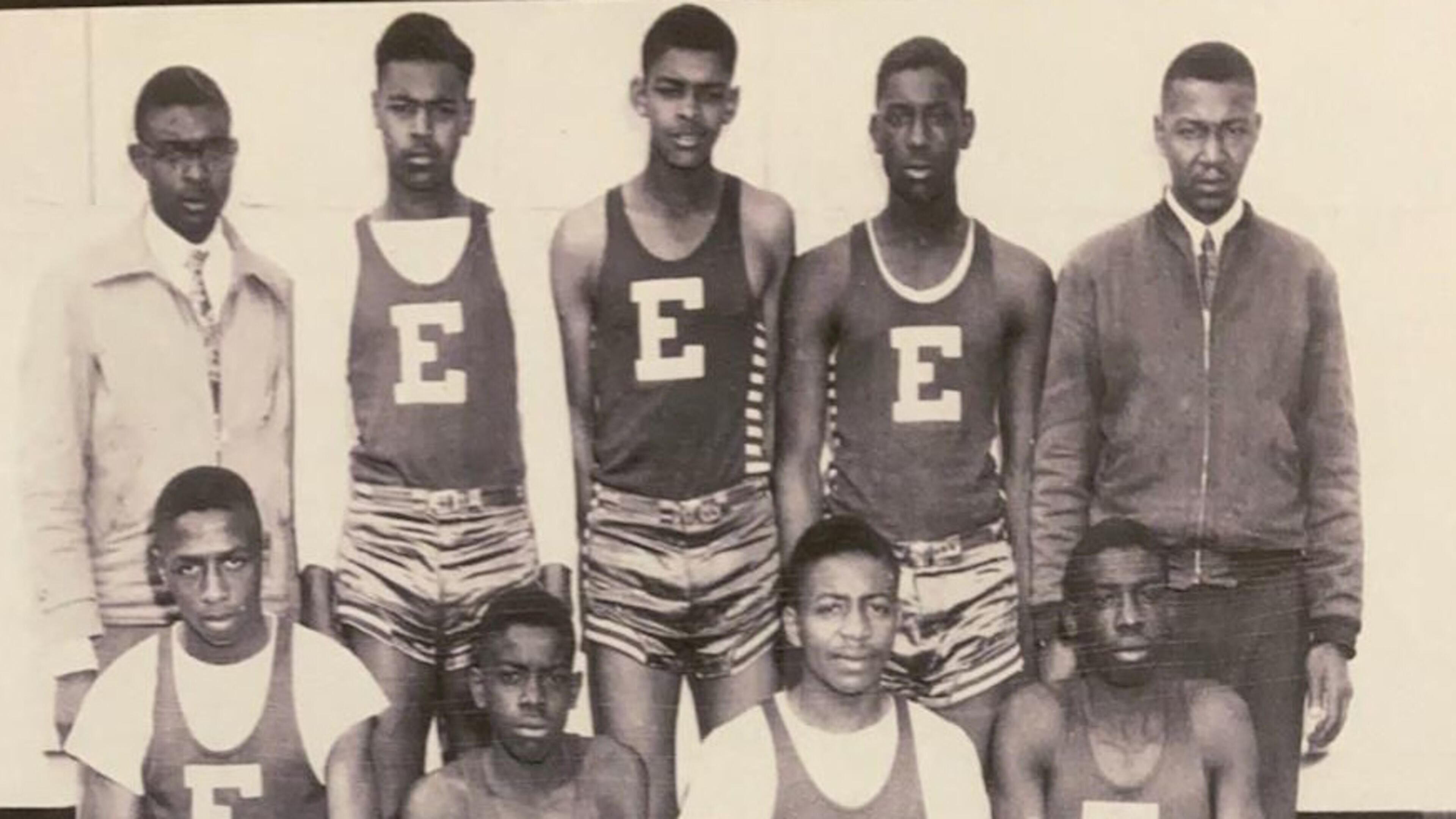 Eatonton Colored High School's basketball team from the 1949-50 GIA season. Pictured are (front row, from left) Herbert Stokes, J.W. Freeman, Frederick Griffith, Charles Freeman and (back row, from left) coach Odell Owens, Willie Frank Daniel, James Few, Roy Little and Principal W.N. McGlockton. Charles Freeman, now 91, is among the former GIA athletes interviewed in the GPB documentary "As If We Were Ghosts," which will air Monday and Thursday.