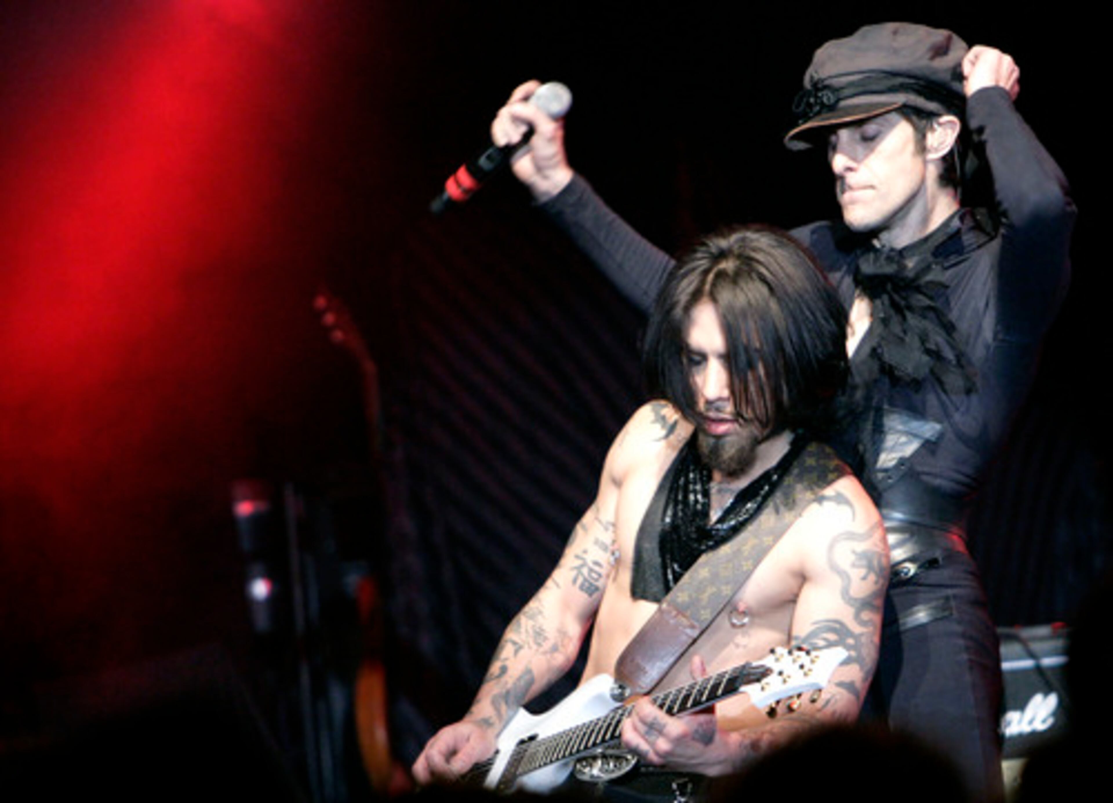SINCE THE BAND'S breakup, Navarro (left) has played with the Red Hot Chili Peppers, the Panic Channel and Camp Freddy. Farrell formed a band called Perry Farrell's Satellite Party.