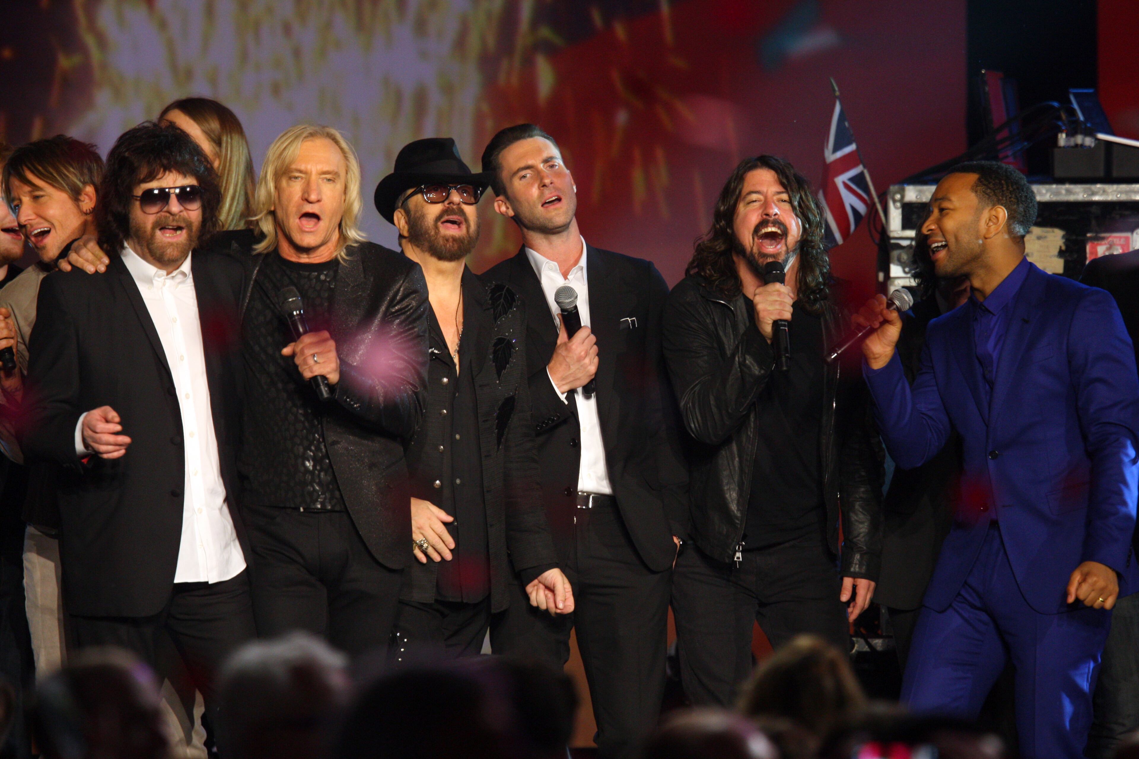 Keith Urban, Jeff Lynne, Joe Walsh, Dave Stewart, Adam Levine, Dave Grohl and John Legend perform at The Night that Changed America: A Grammy Salute to the Beatles, on Monday, Jan. 27, 2014, in Los Angeles. (Photo by Zach Cordner/Invision/AP)
