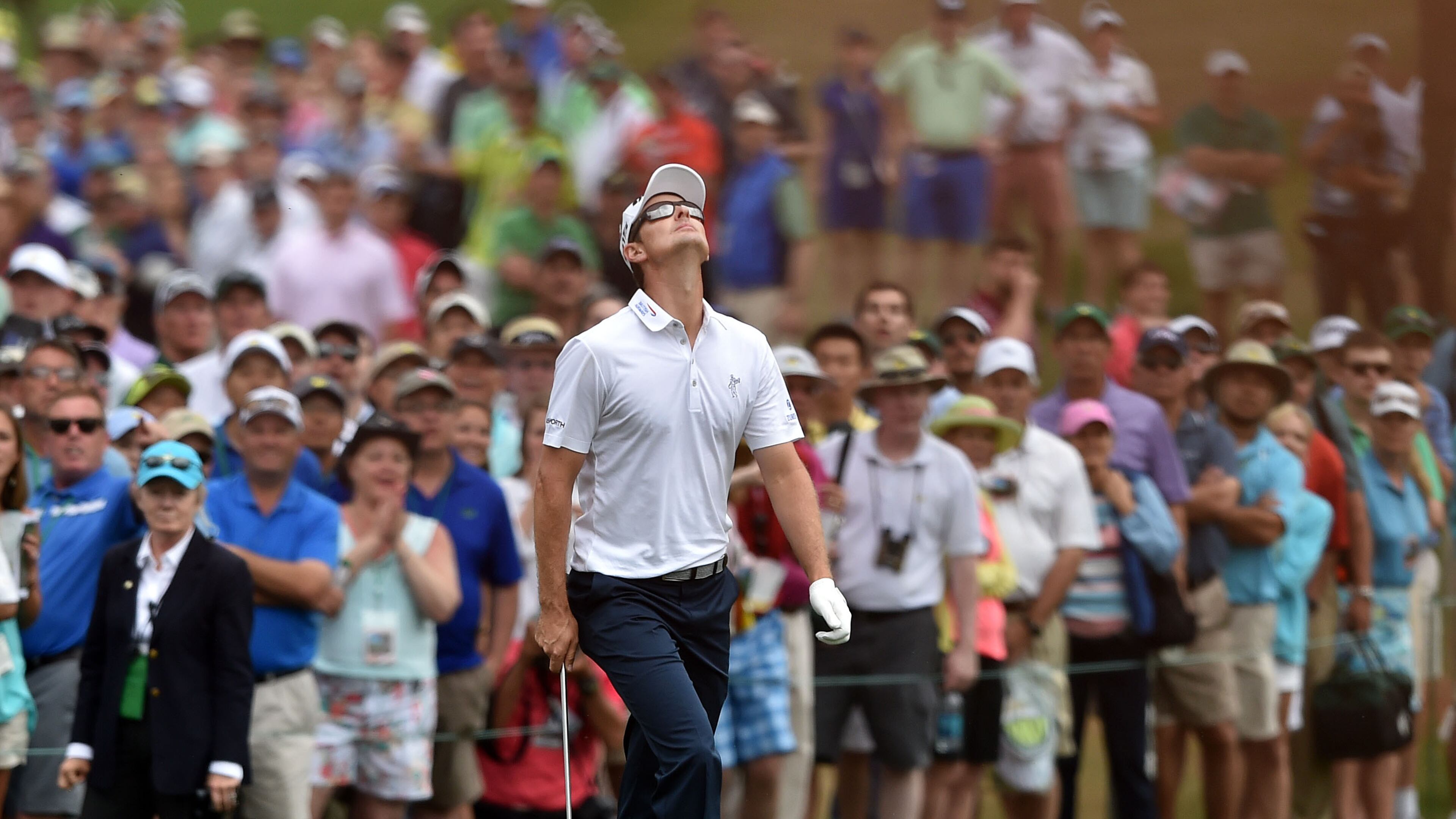 Justin Rose reacts after almost holing a chip from the rough for a birdie on No. 7 during the final round of the Masters on Sunday at Augusta National. (BRANT SANDERLIN/BSANDERLIN@AJC.COM)
