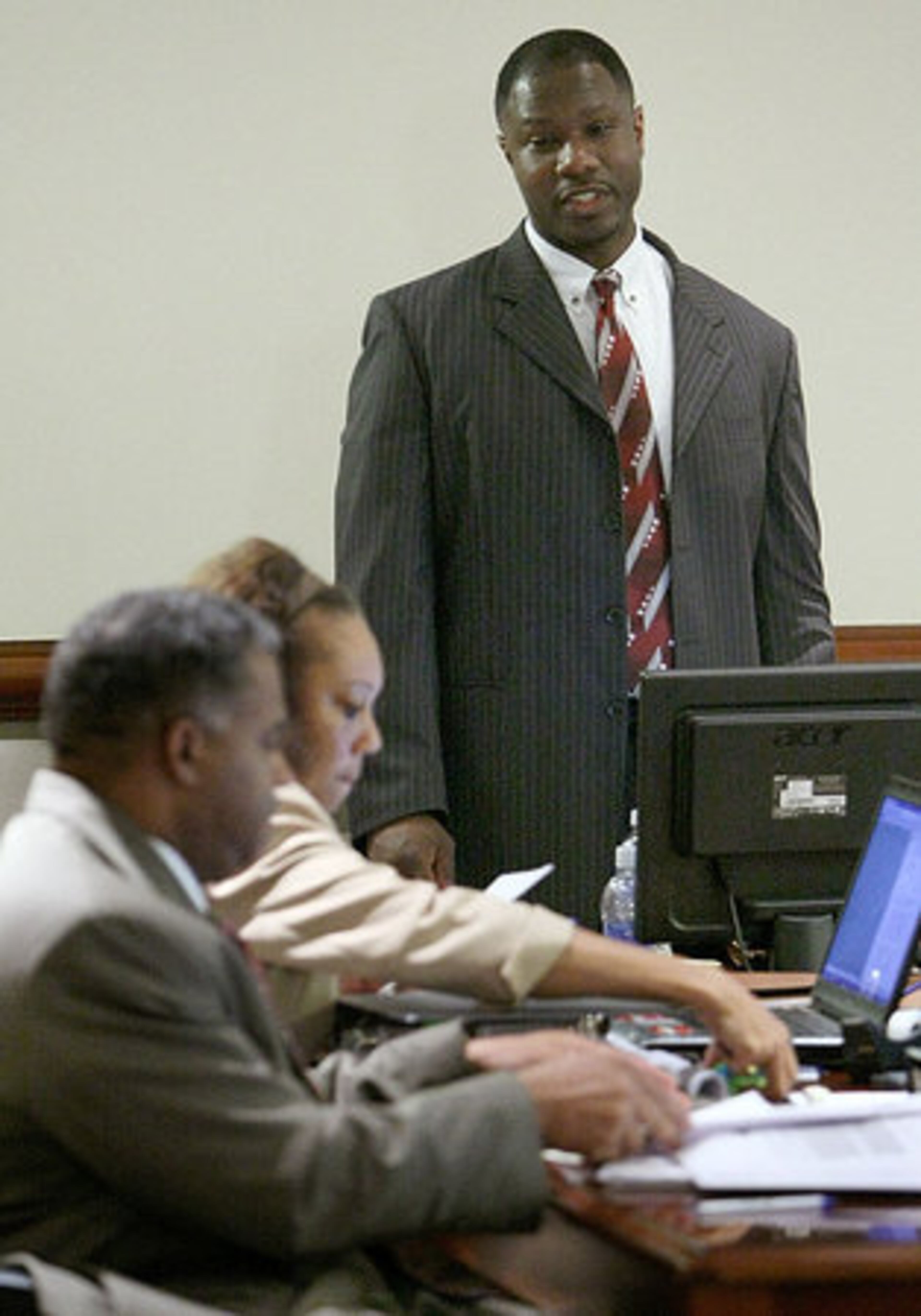 Brian Nichols stands while waiting for the jury to enter during Wednesday's proceedings.