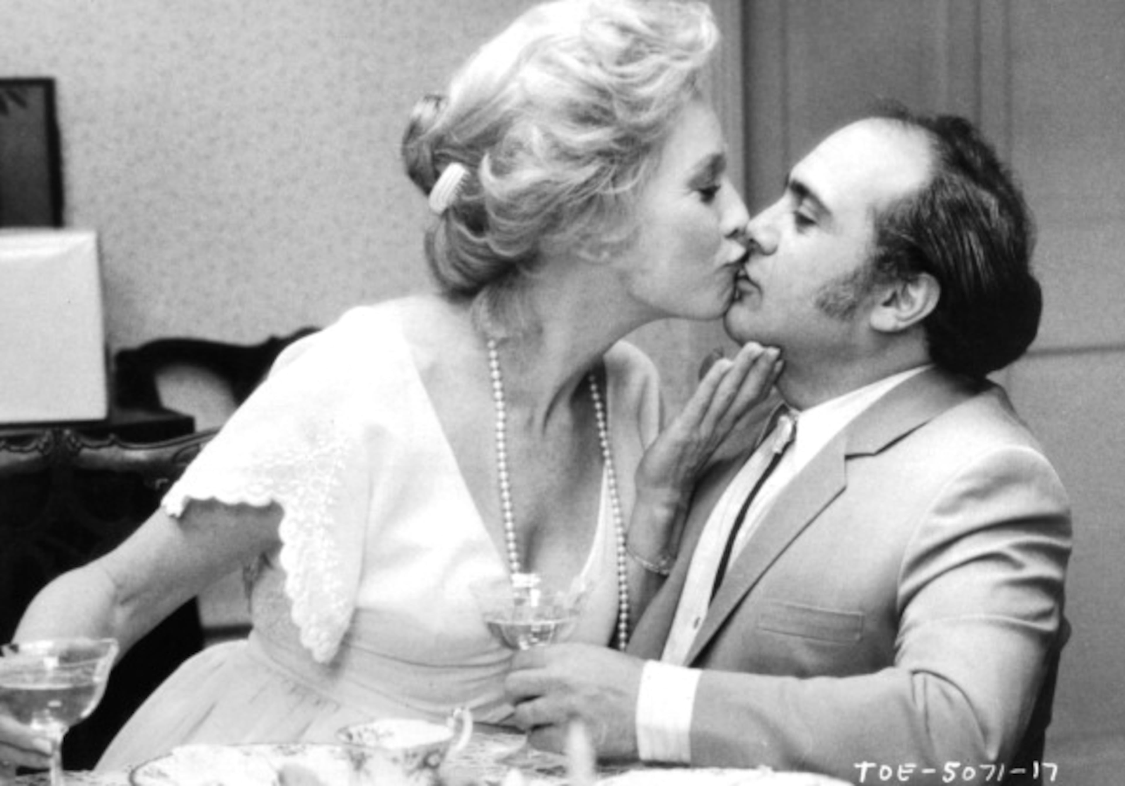 Shirley MacLaine kisses Danny DeVito in a scene from the film "Terms of Endearment," 1983.