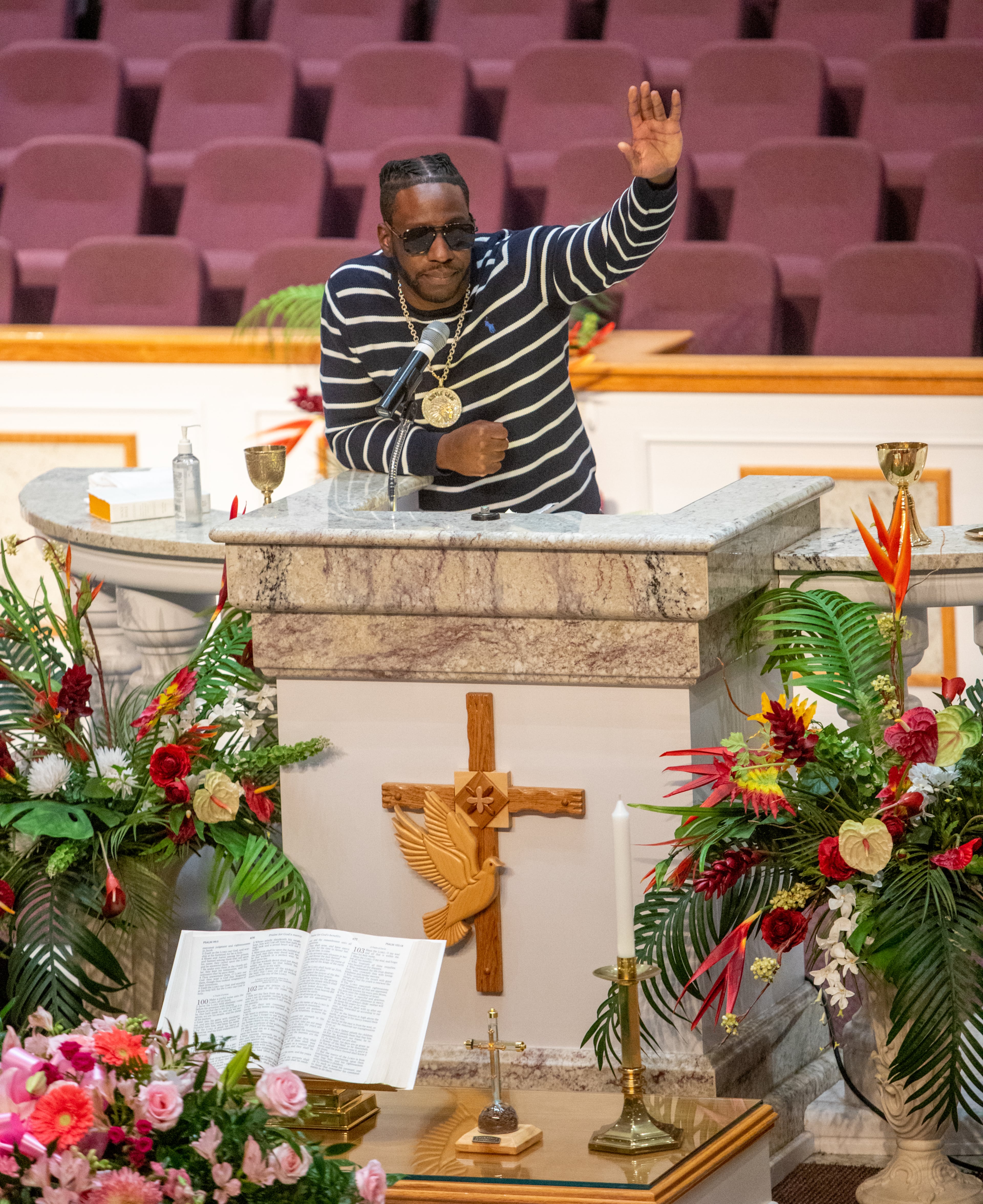 Friends, classmates and family members, including Young Dro, who knew Bre'Asia Powell all her life, speaks at the teen’s memorial service at Jackson Memorial Baptist Church in Atlanta on Saturday, June 3, 2023. (Jenni Girtman for The Atlanta Journal-Constitution)