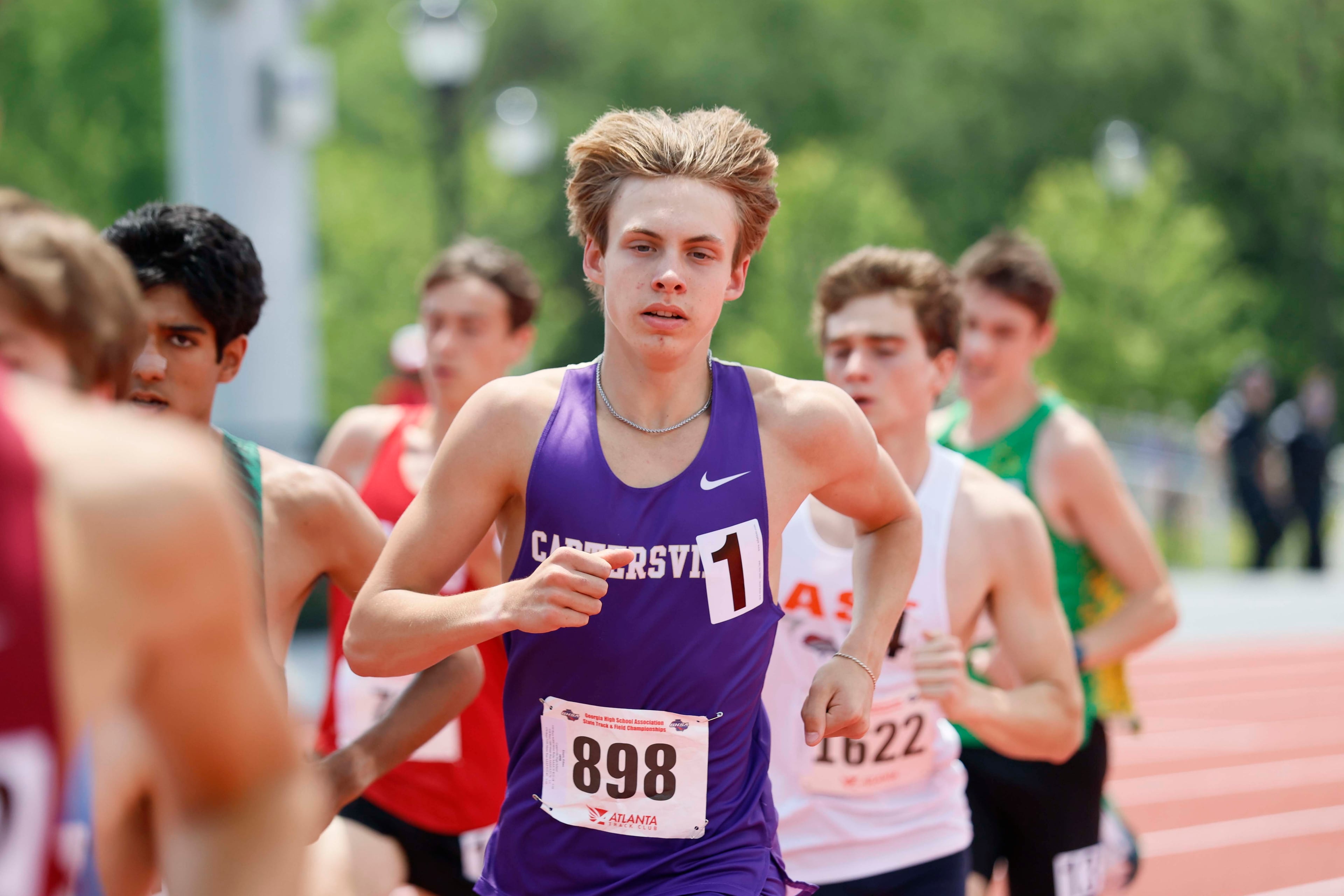 Runners compete in the Boys 1600-meter Run AAAA at the GHSA track and field state championships at UGA Spec Towns Track on Monday, May 11, 2026, in Athens.
(Miguel Martinez/AJC)