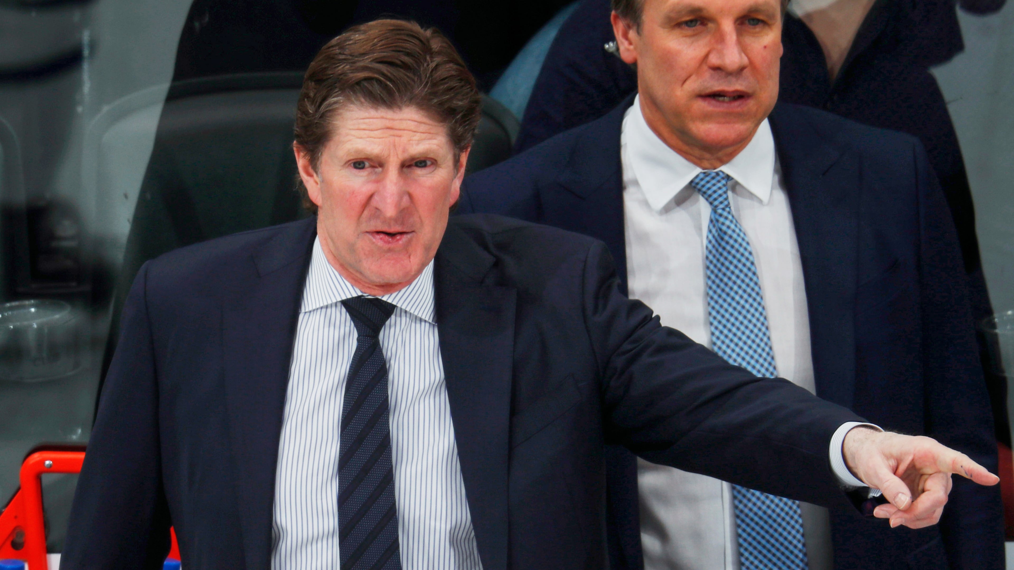 FILE - Toronto Maple Leafs head coach Mike Babcock directs his team against the Colorado Avalanche in the third period of an NHL hockey game, Feb. 12, 2019, in Denver. (AP Photo/David Zalubowski, File)