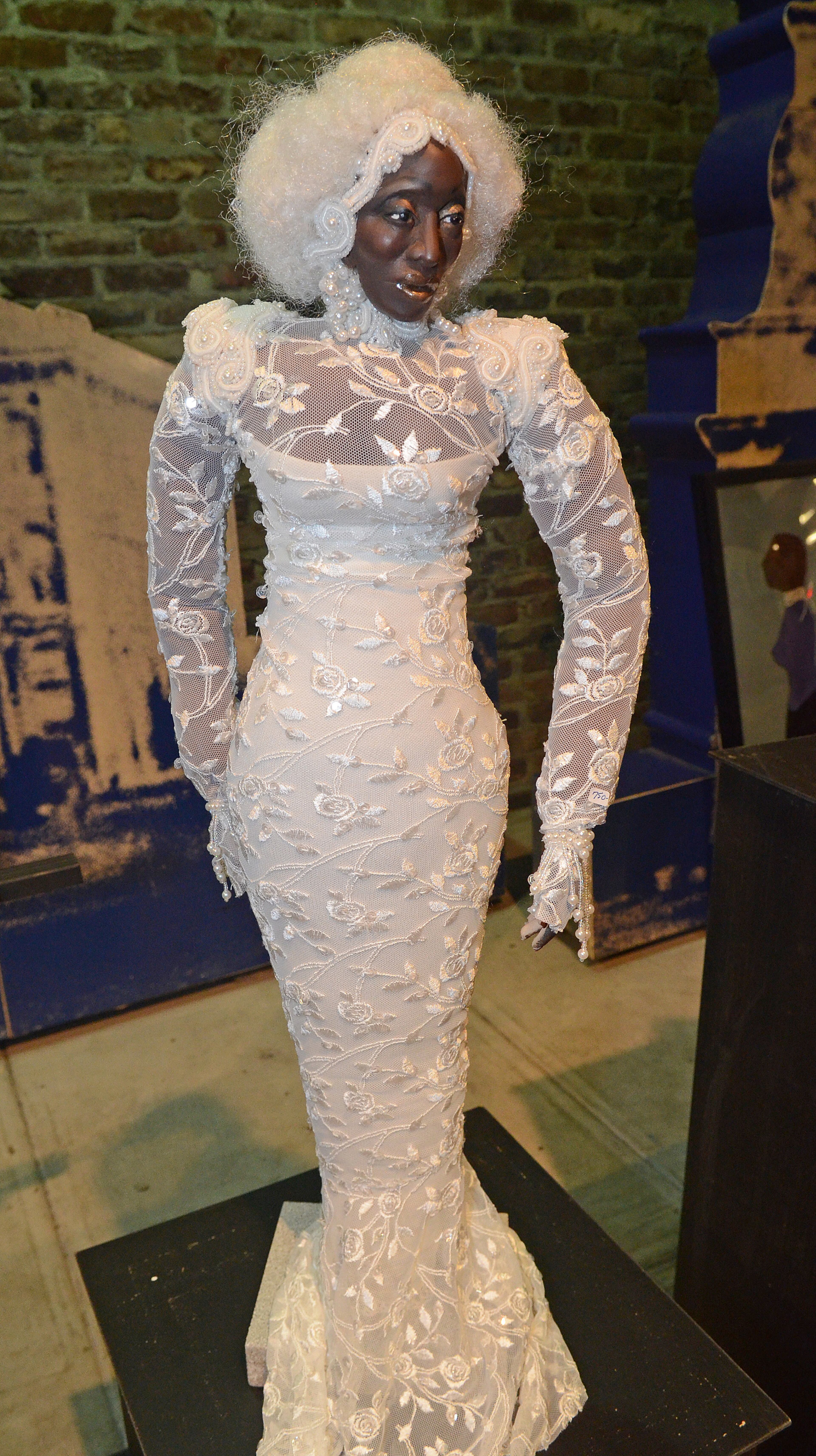 Lifelike dolls are the work of artist Patricia Coleman-Cobb and won Best of Show in the Home Decor category at the 19th Annual Heritage Arts and Soul Festival at Underground Atlanta. (CHRIS HUNT/SPECIAL)