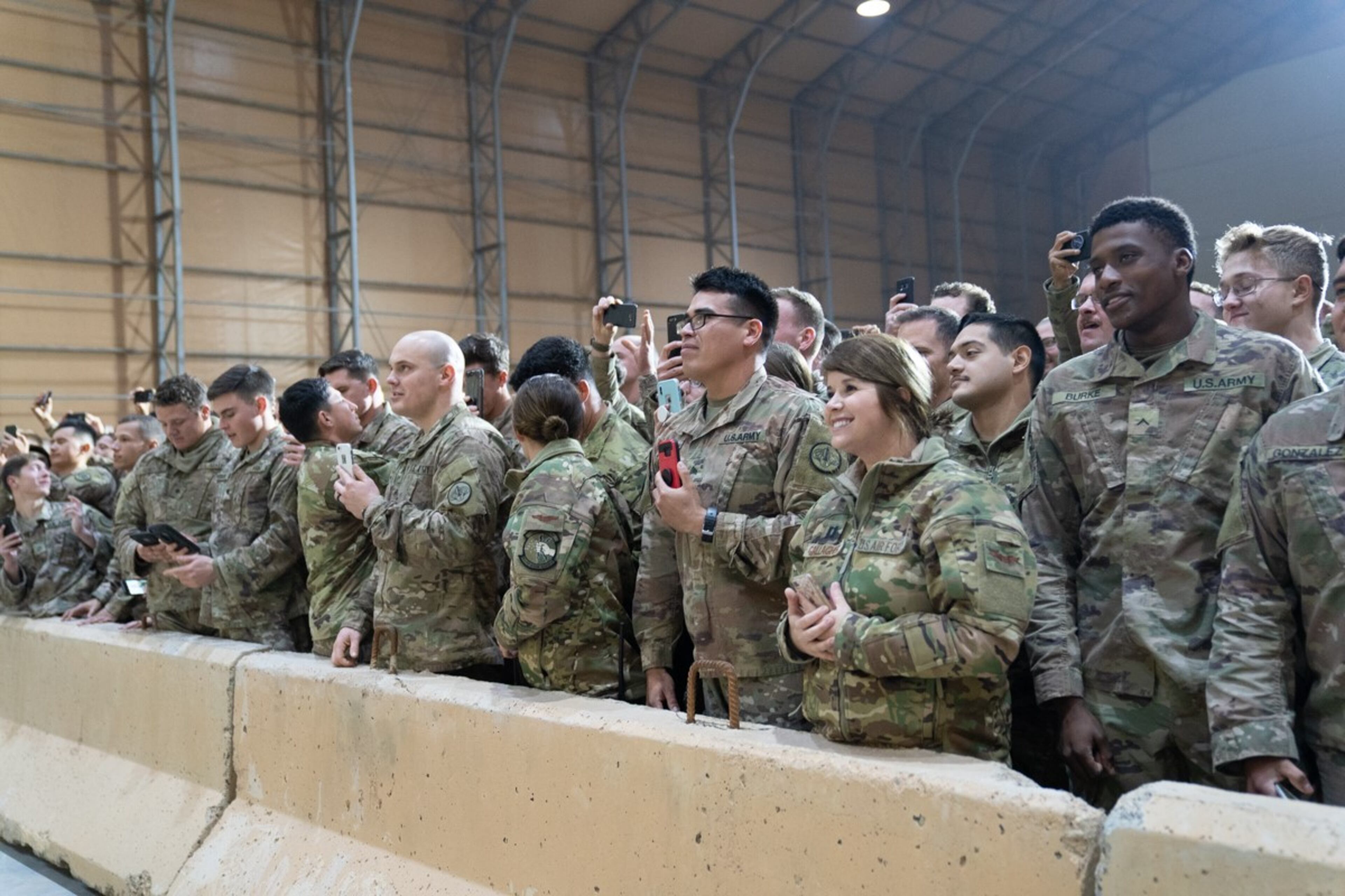 U.S. troops listen as President Donald J. Trump, joined by First Lady Melania Trump, addresses his remarks to U.S. troops Wednesday, December 26, 2018, at the Al-Asad Airbase in Iraq.