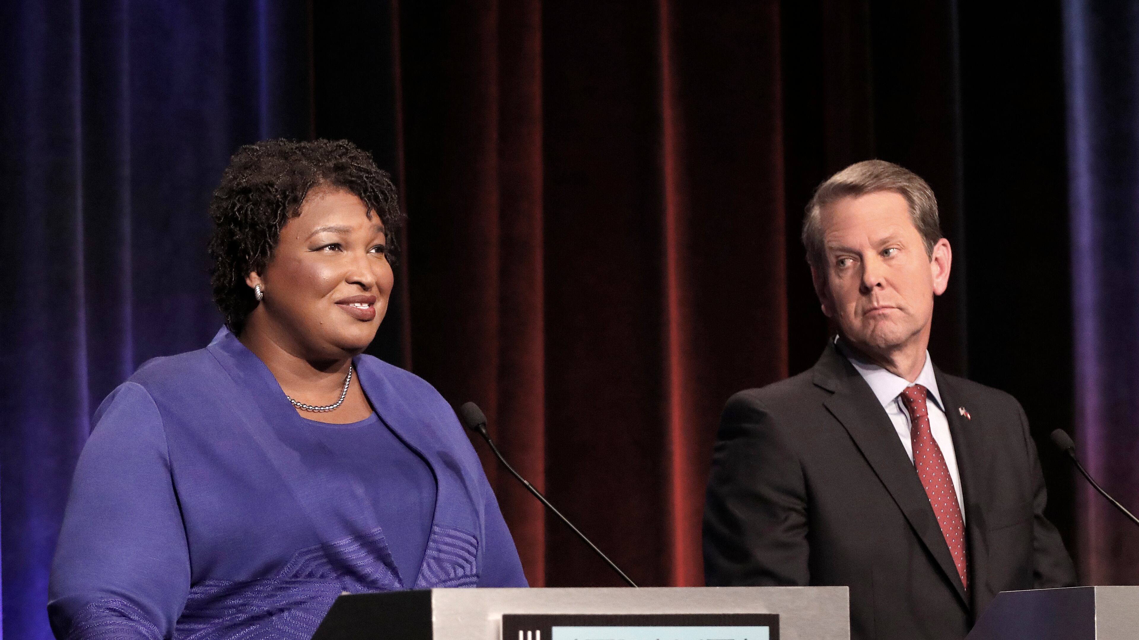 ATLANTA, GA - OCTOBER 23: Georgia gubernatorial candidates (L-R) Democrat Stacey Abrams and Republican Brian Kemp debate in an event that also included Libertarian Ted Metz at Georgia Public Broadcasting in Midtown October 23, 2018 in Atlanta, Georgia. (Photo by John Bazemore-Pool/Getty Images)