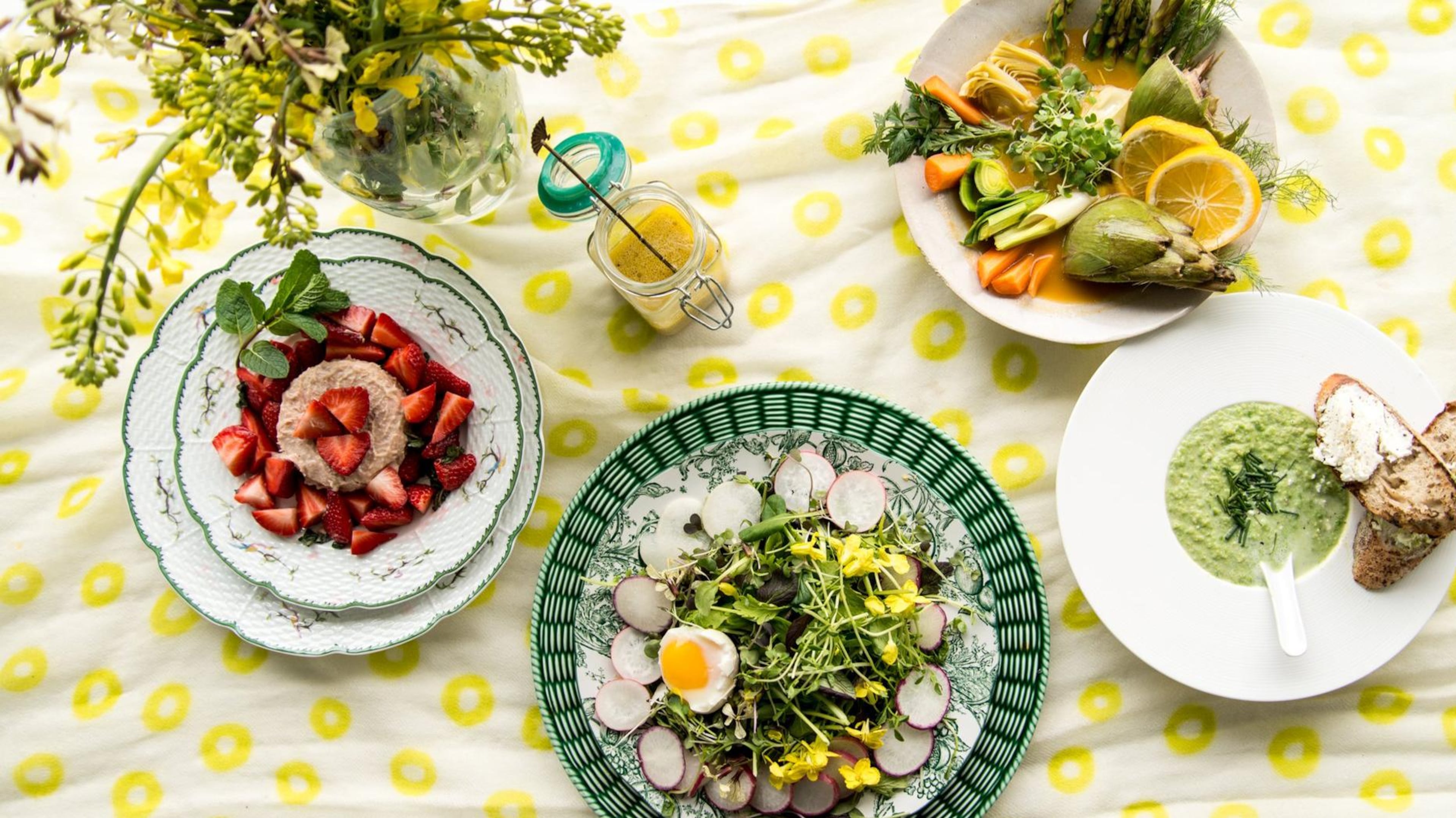 With spring in the air and more farmers markets starting to open around metro Atlanta, you can put your produce to great use in dishes such as Rhubarb Panna Cotta With Mint and Macerated Strawberries (left), Spring Lettuces With Radishes, Edible Flowers, Egg and Elderflower Dressing (center), Provencal Barigoule With Early Spring Vegetables (upper right) and Spring Pea Soup With Goat Cheese Crostini (right). STYLING BY LISA HANSON / CONTRIBUTED BY MIA YAKEL