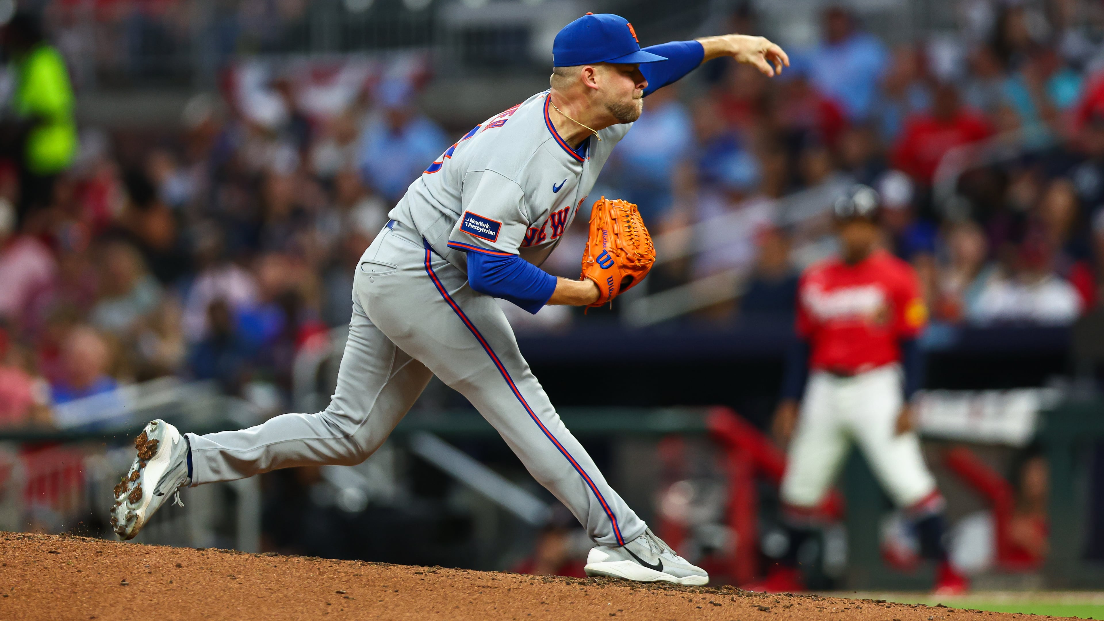 New York Mets pitcher A.J. Minter delivers in the fifth inning of a baseball game against the Atlanta Braves, Friday, July 3, 2026, in Atlanta. (AP Photo/Colin Hubbard)