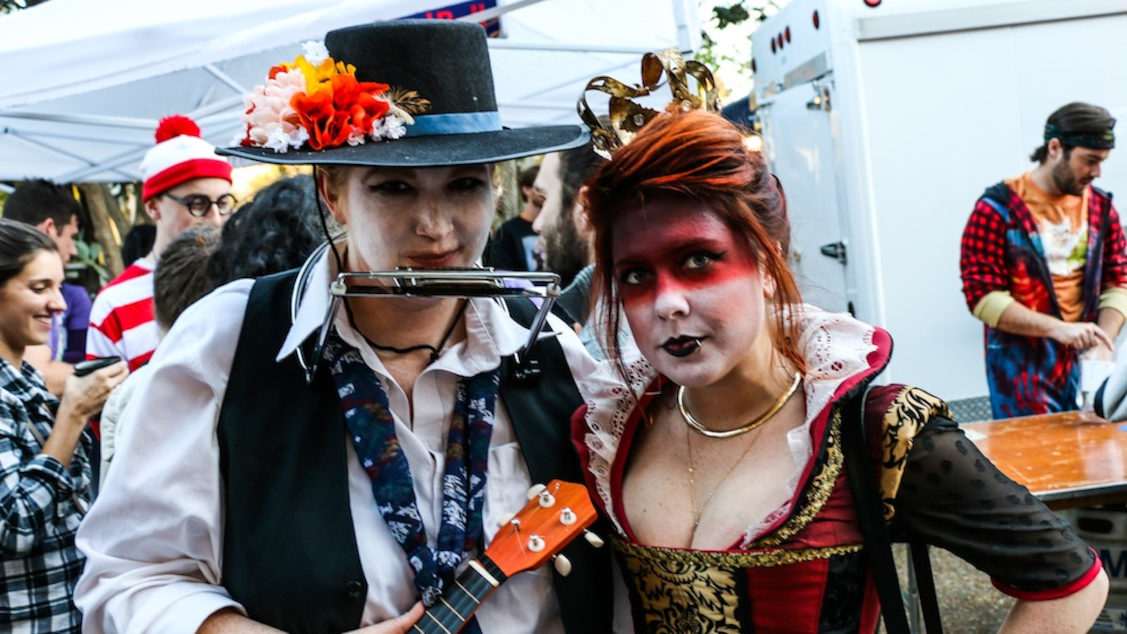 Revelers in fun and frightful costumes flock to Little Five Points for the Little Five Points Halloween Festival and Parade. (Janay Kingsberry/AJC)